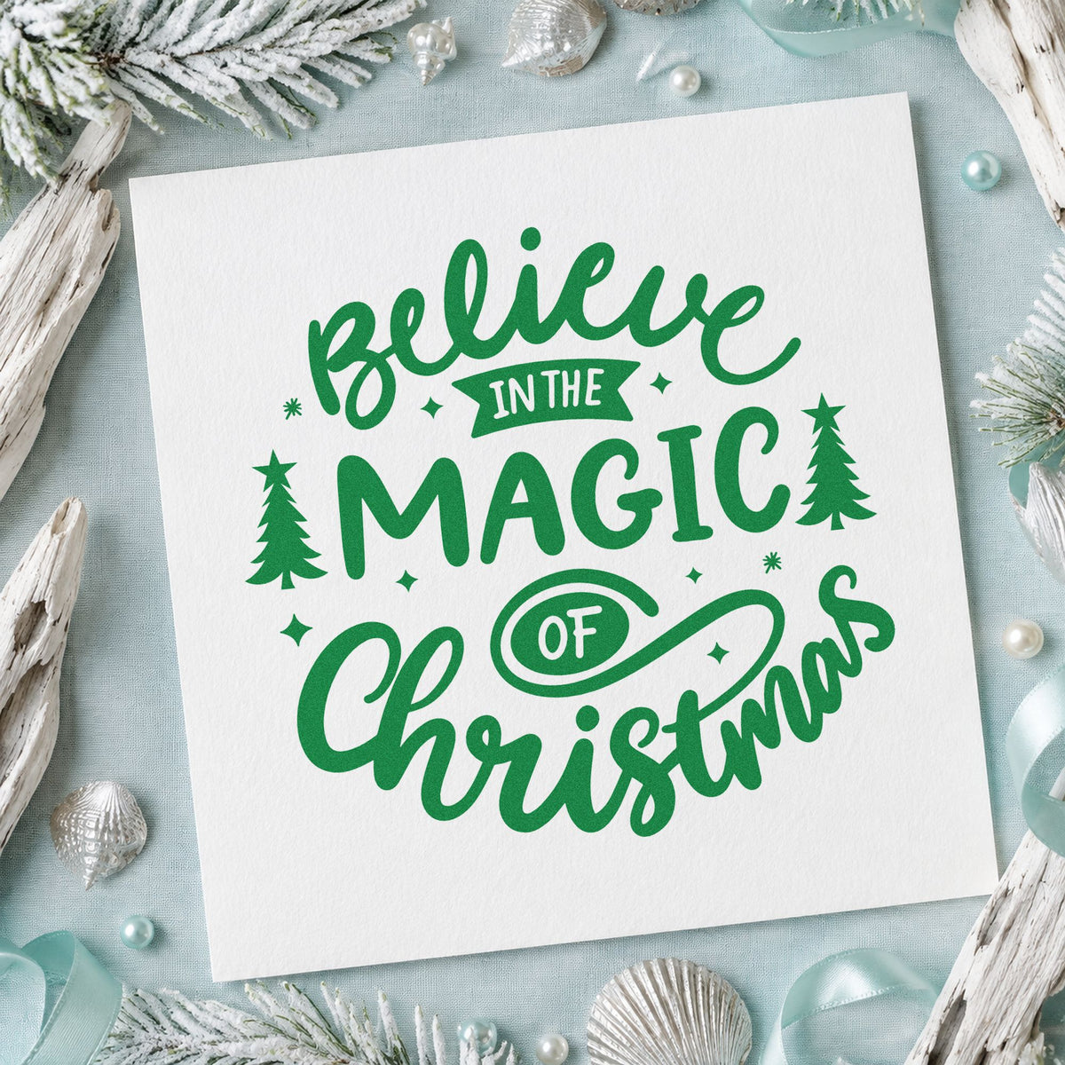 Believe Magic Of Christmas craft stamp imprint in green ink on a handmade project, one idea being enchanted favor tags.