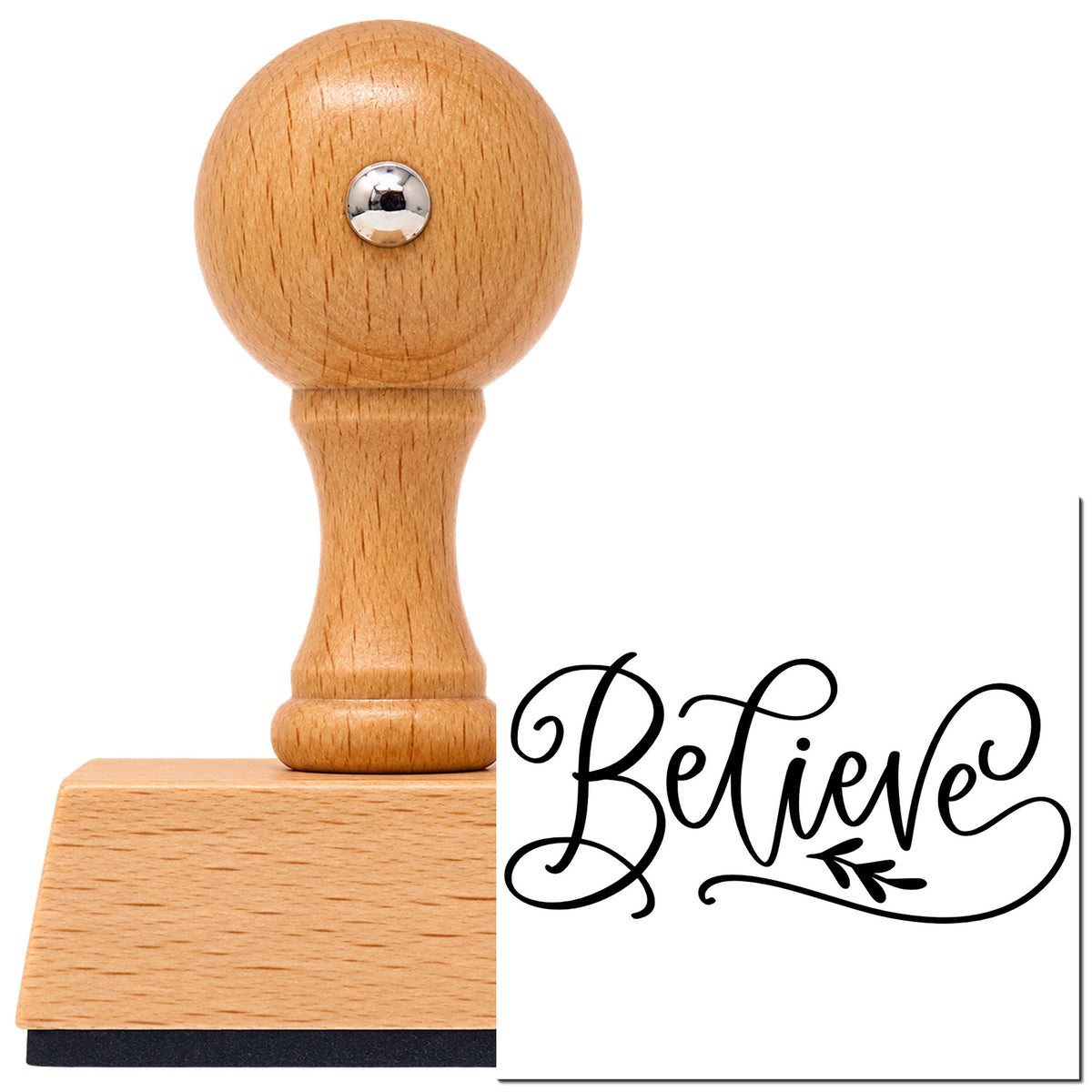 Vintage Pro beech wood stamp with a round knob handle, shown with its black Believe With Leaf Flourish imprint on white.