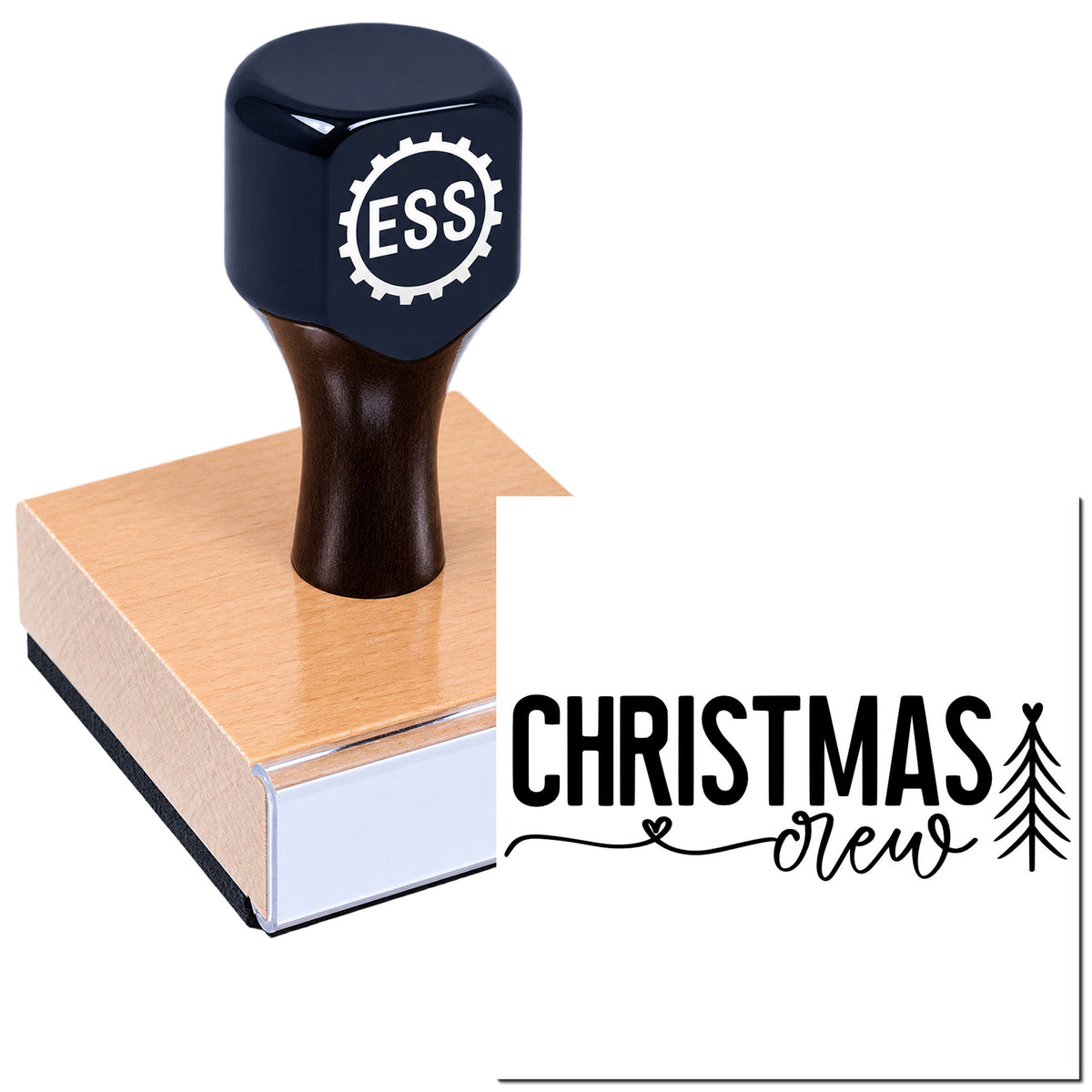 Black ESS rubber stamp and seal on a pink block, featuring Christmas Crew design in bold black lettering.
