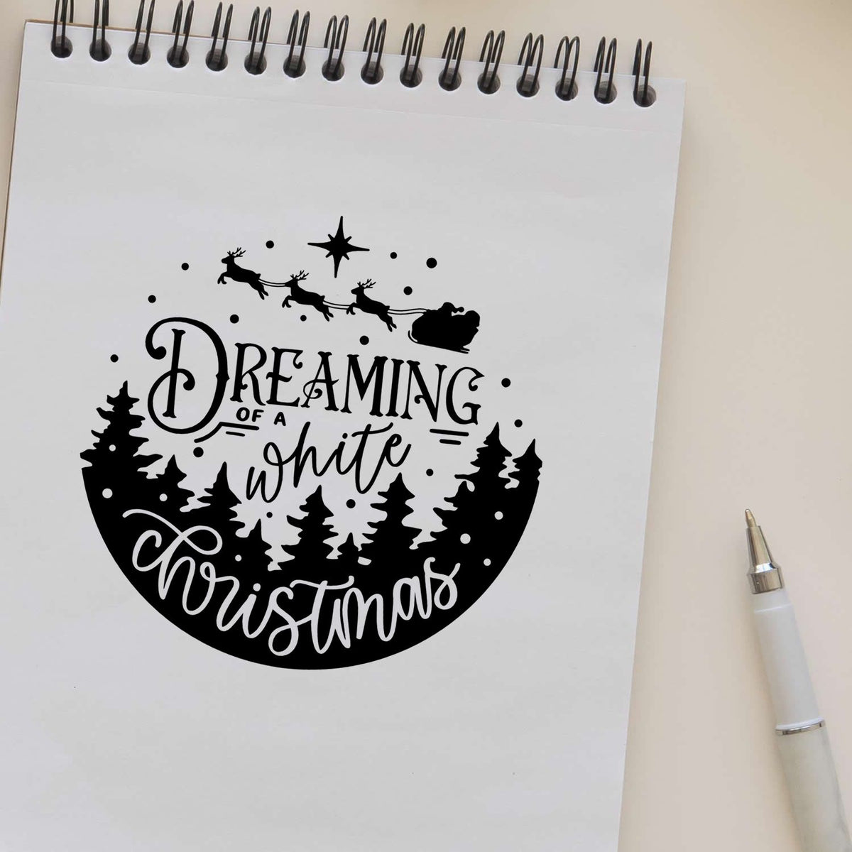 Black circular Christmas stamp seal with Santa sleigh, reindeer, pine trees, and Dreaming of a White Christmas text.