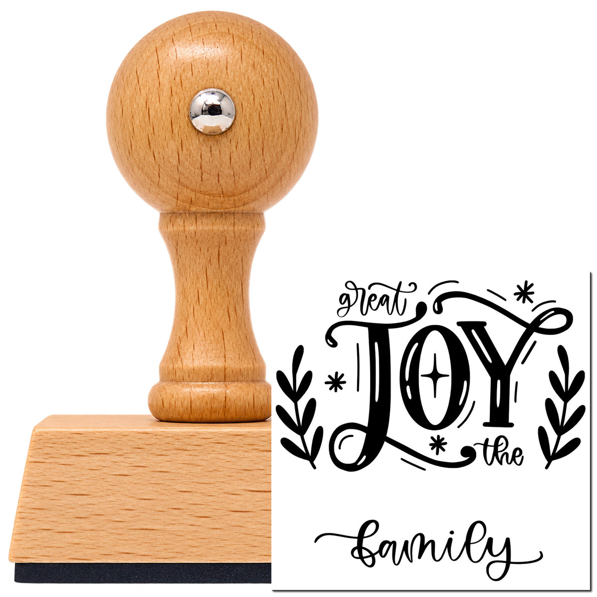 Vintage Pro beech wood stamp with a round knob handle, shown with its black Great Joy To The Family Leafy Branches imprint on white.