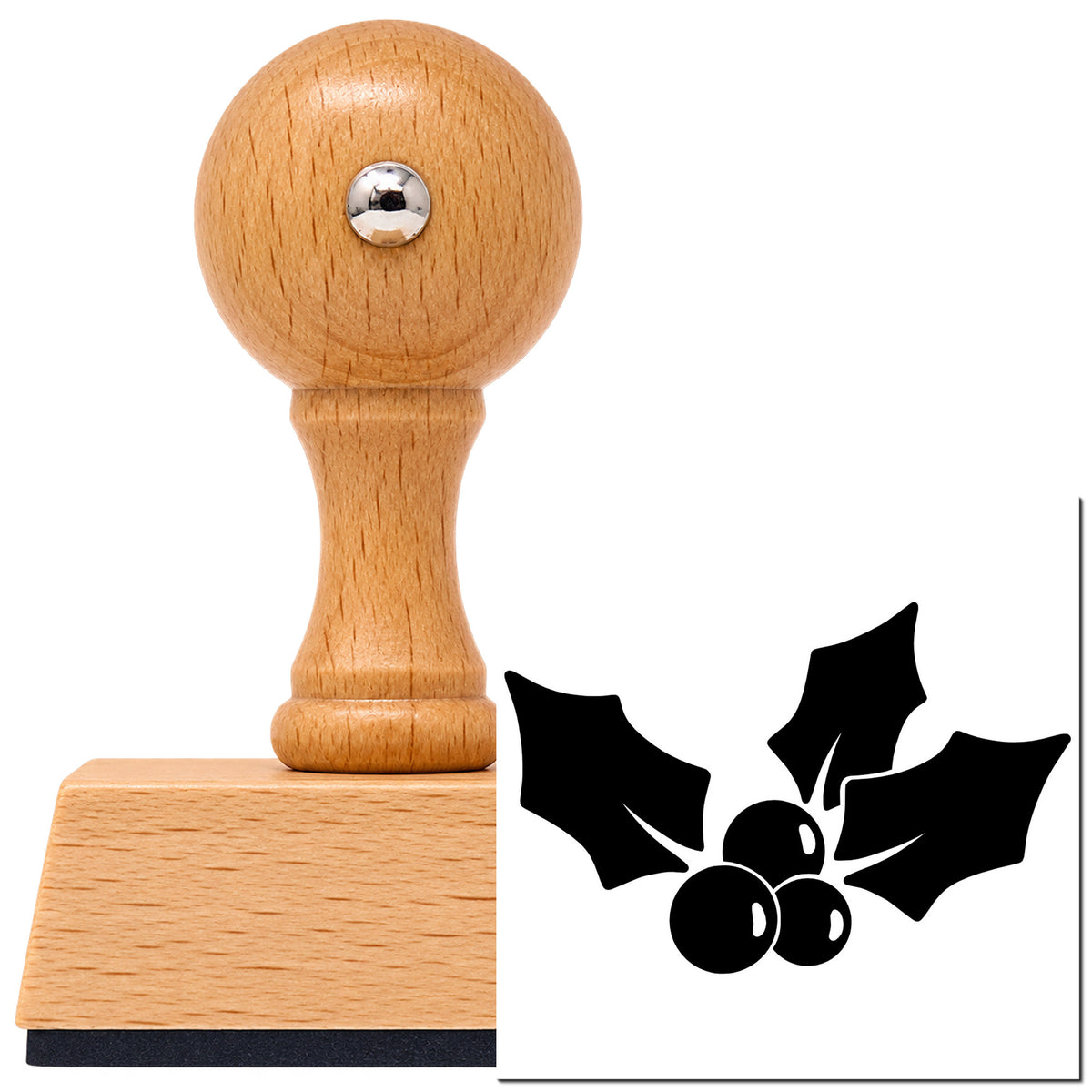 Vintage Pro beech wood stamp with a round knob handle, shown with its black Holly Sprig With Three Leaves imprint on white.