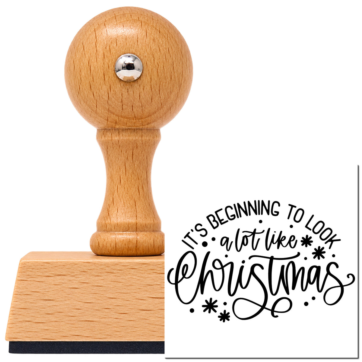 Vintage Pro beech wood stamp with a round knob handle, shown with its black Beginning To Look Like Christmas imprint on white.