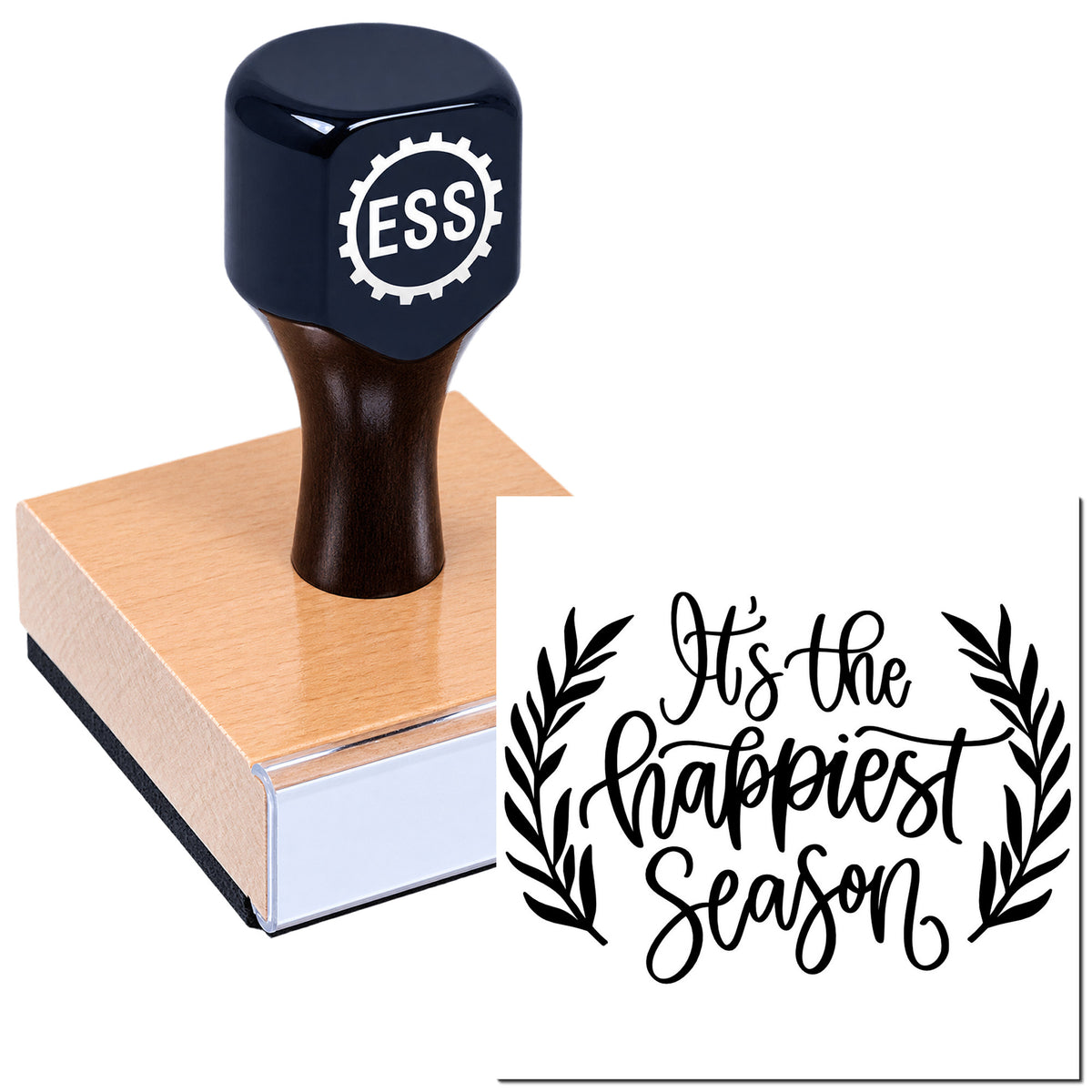 Black ESS rubber stamp on pink sealing block, with "It's the Happiest Season" laurel seal design.