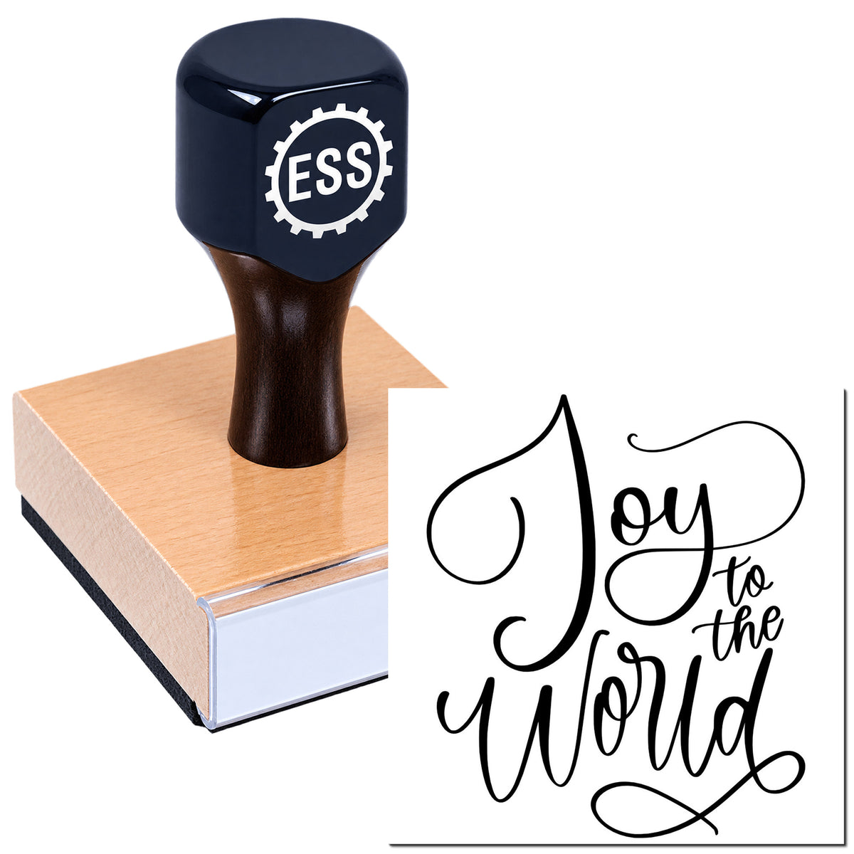 Black custom stamp and seal on wooden block with white "Joy to the world" calligraphy design.