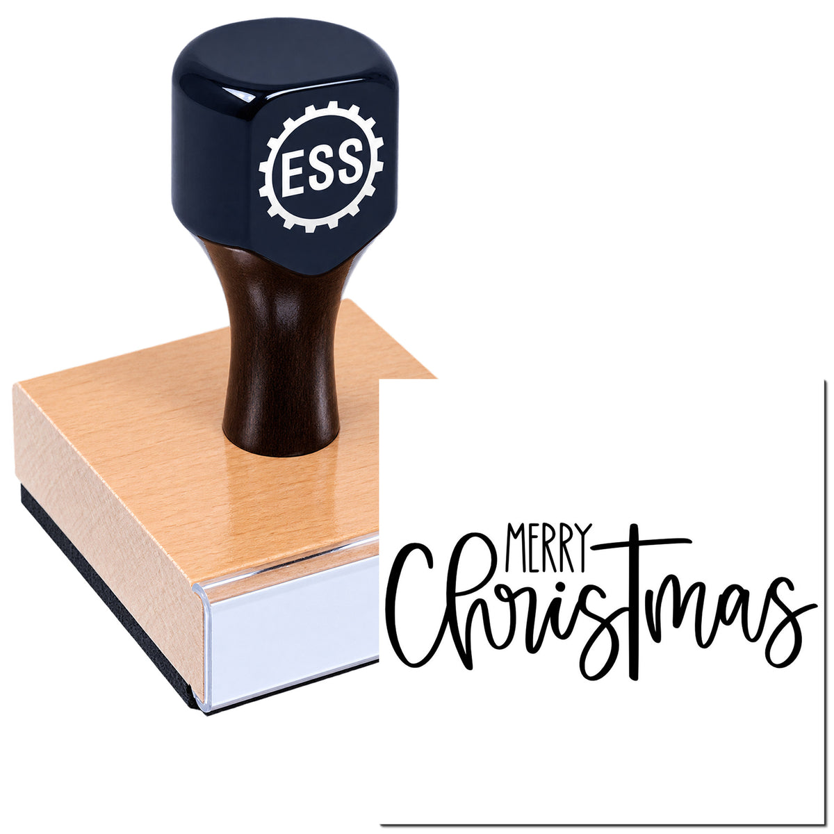 Black ESS custom stamp and seal on wooden block, printing Merry Christmas in bold black script.
