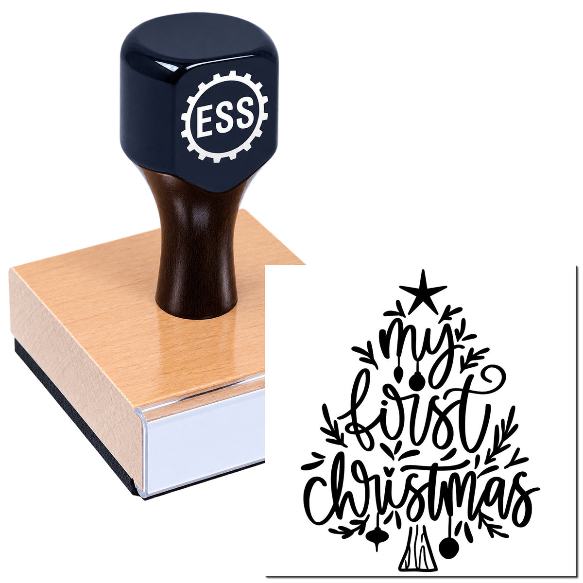 Dark navy ESS rubber stamp on a wooden block with a black Merry Christmas seal design.