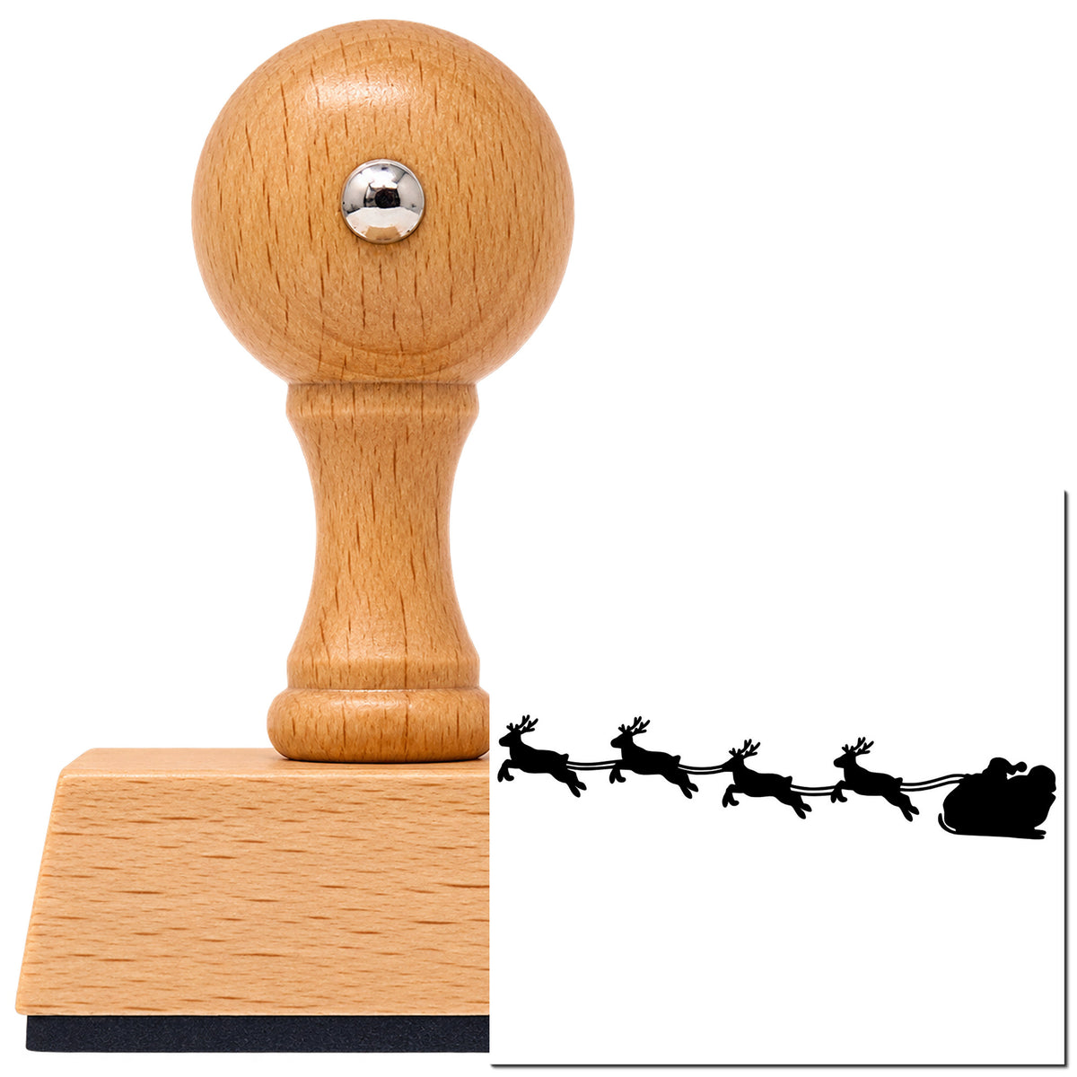 Vintage Pro beech wood stamp with a round knob handle, shown with its black Santa Sleigh Reindeer Silhouette imprint on white.