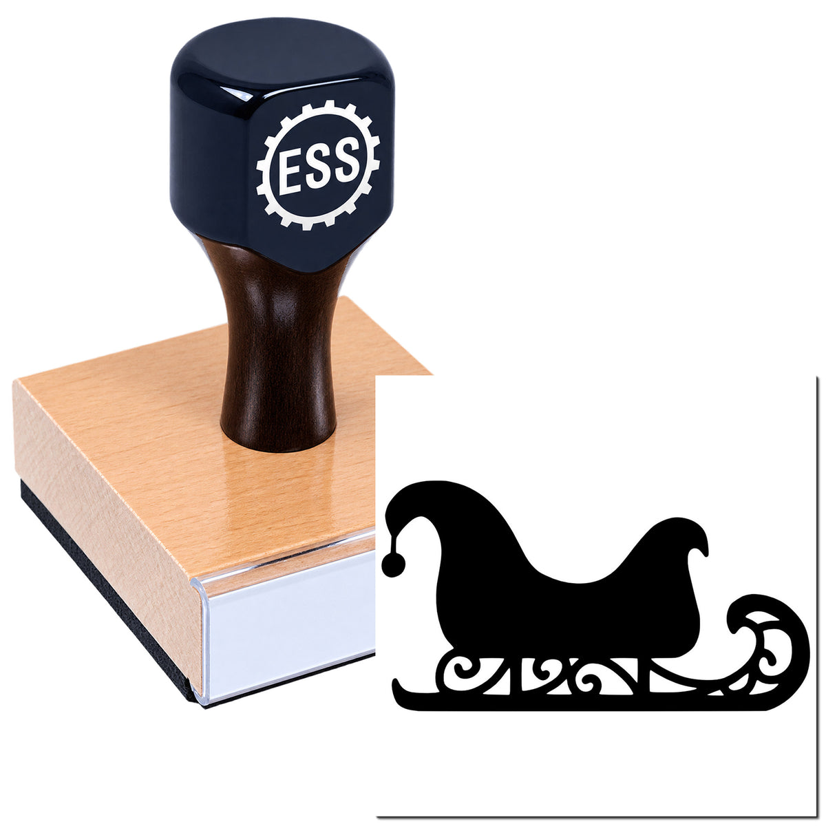 Navy ESS rubber stamp on a wooden block beside a black decorative seal design on a white background.