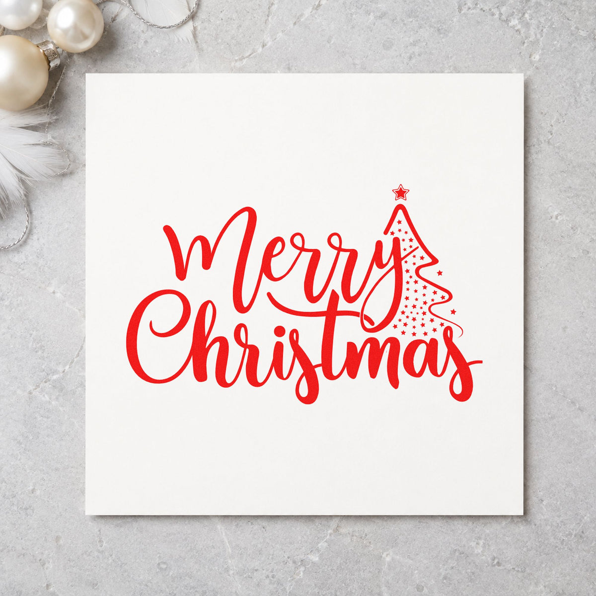Merry Christmas With Tree rubber stamp shown in red ink, stamped for projects such as bottle strip labels.