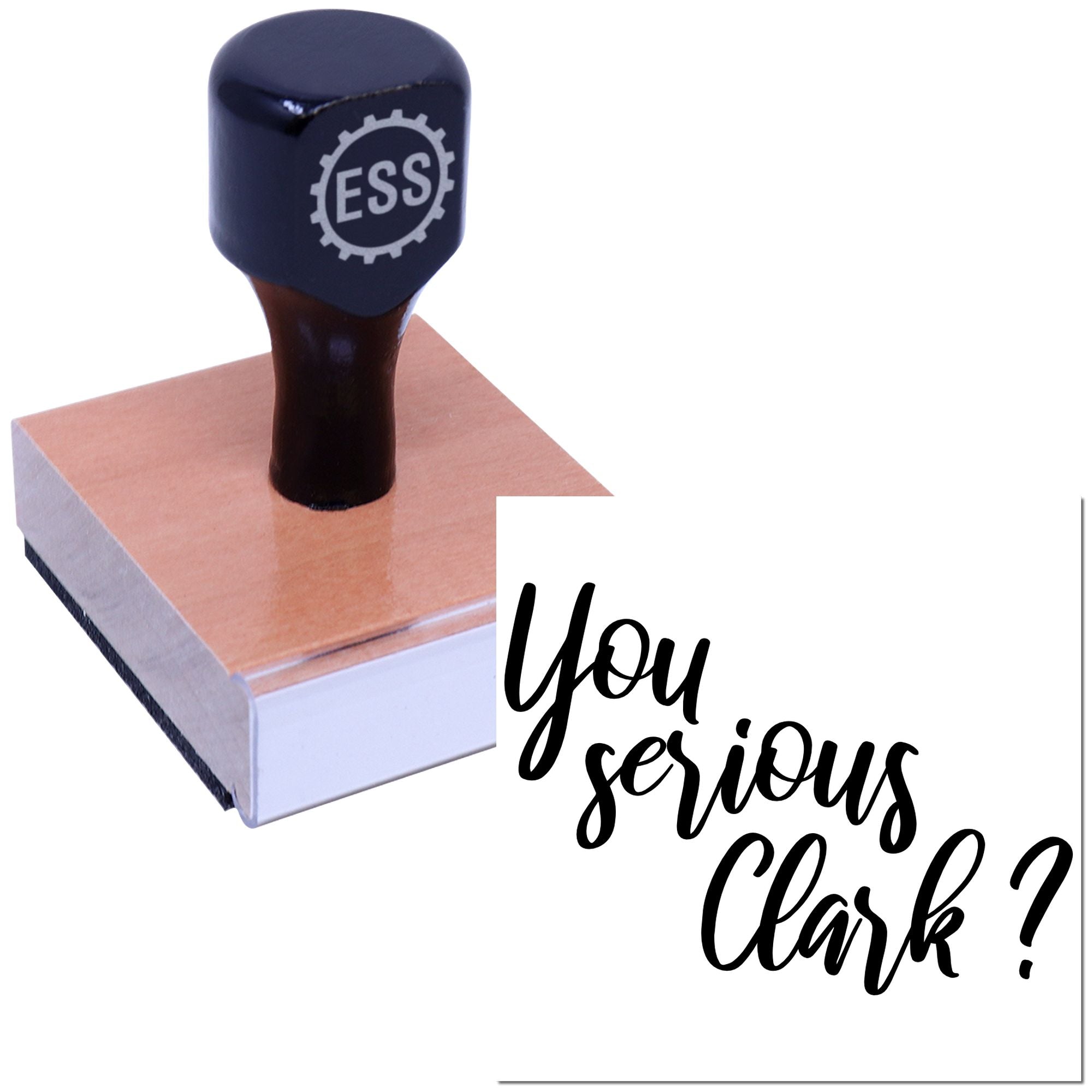 Black ESS self-inking stamp on a tan seal block with white backing and script text, You serious Clark?