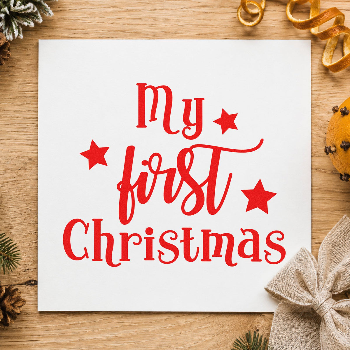 My First Christmas Stars craft stamp in red ink on cardstock, an easy option for collar bandana ink.