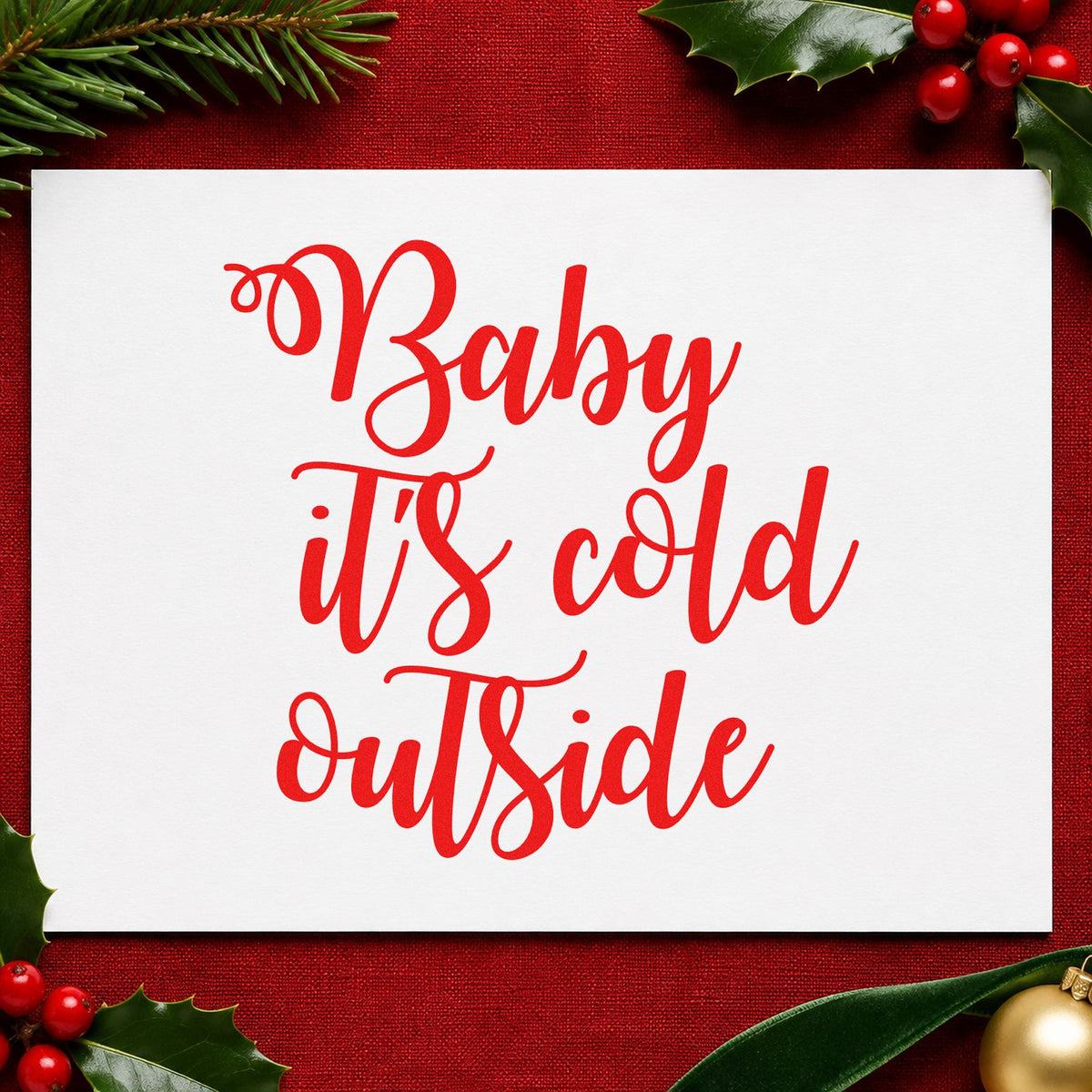 Baby It's Cold Outside Script craft stamp in red ink on cardstock, an easy option for draft stopper ink.