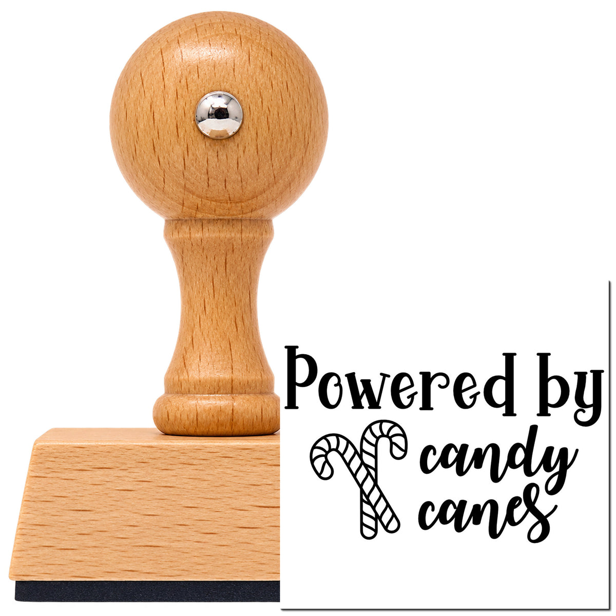 Vintage Pro beech wood stamp with a round knob handle, shown with its black Powered By Candy Canes imprint on white.