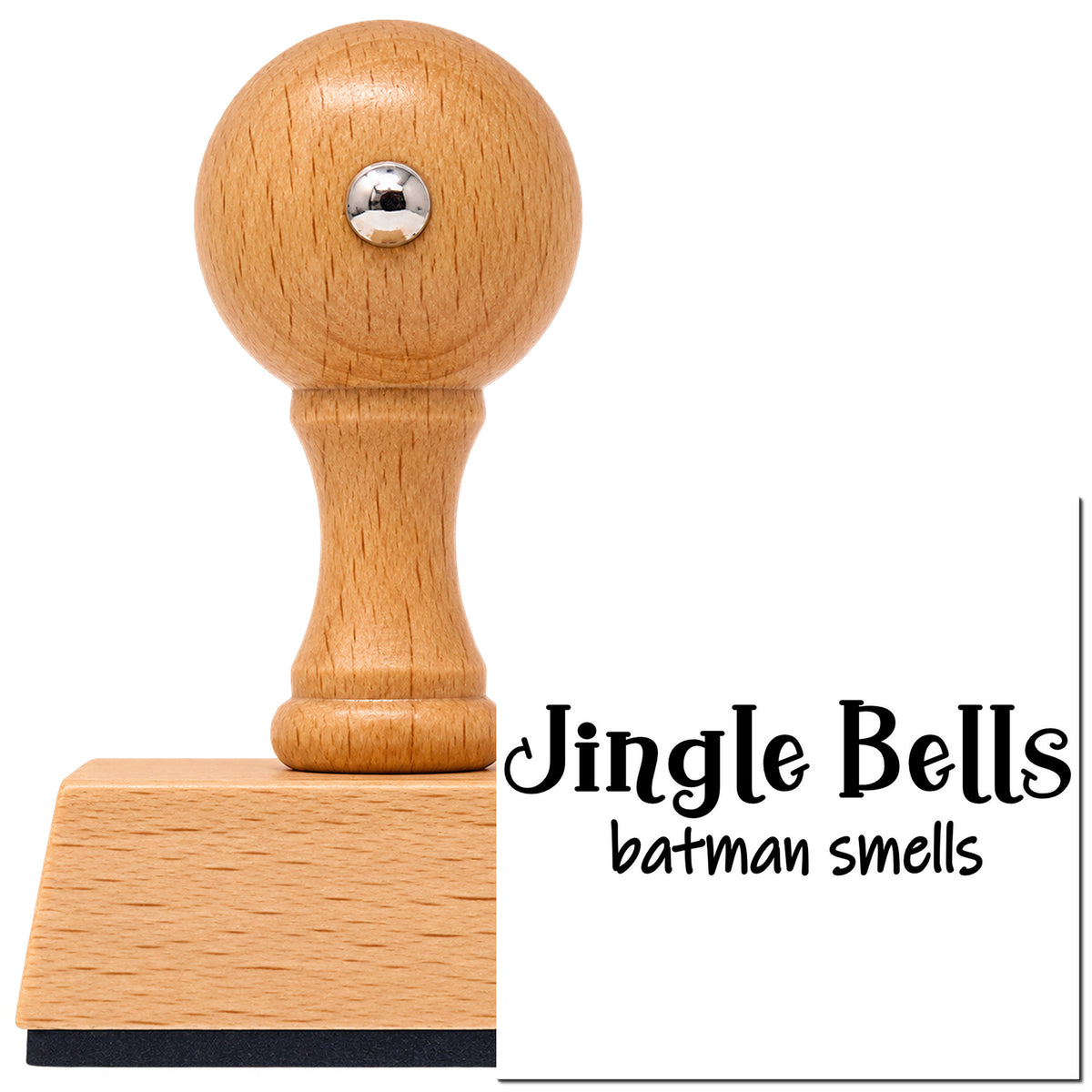 Vintage Pro beech wood stamp with a round knob handle, shown with its black Jingle Bells Batman Smells imprint on white.