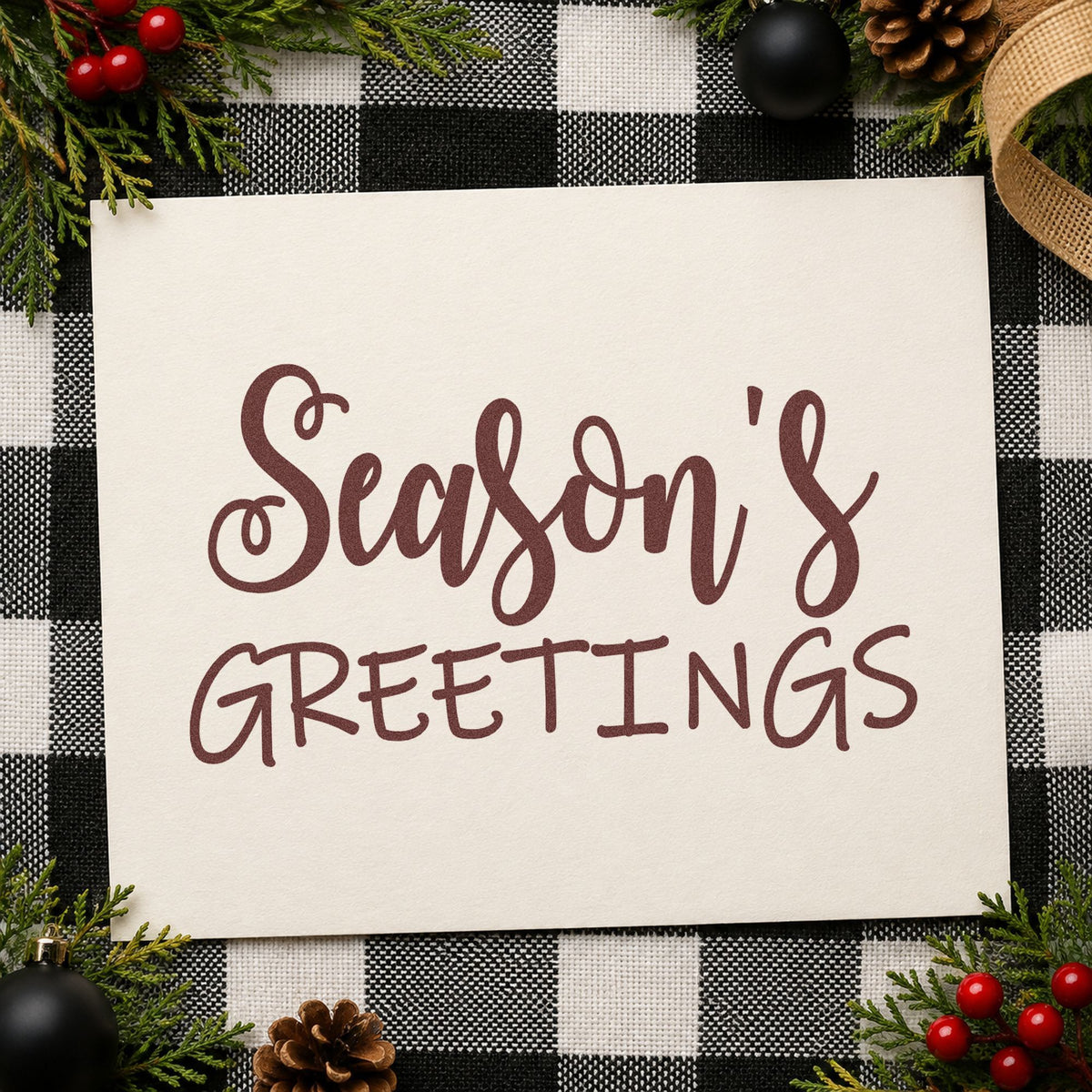Season's Greetings Mixed Lettering rubber stamp printed in brown ink, ready for reservation log sheet and similar paper crafts.