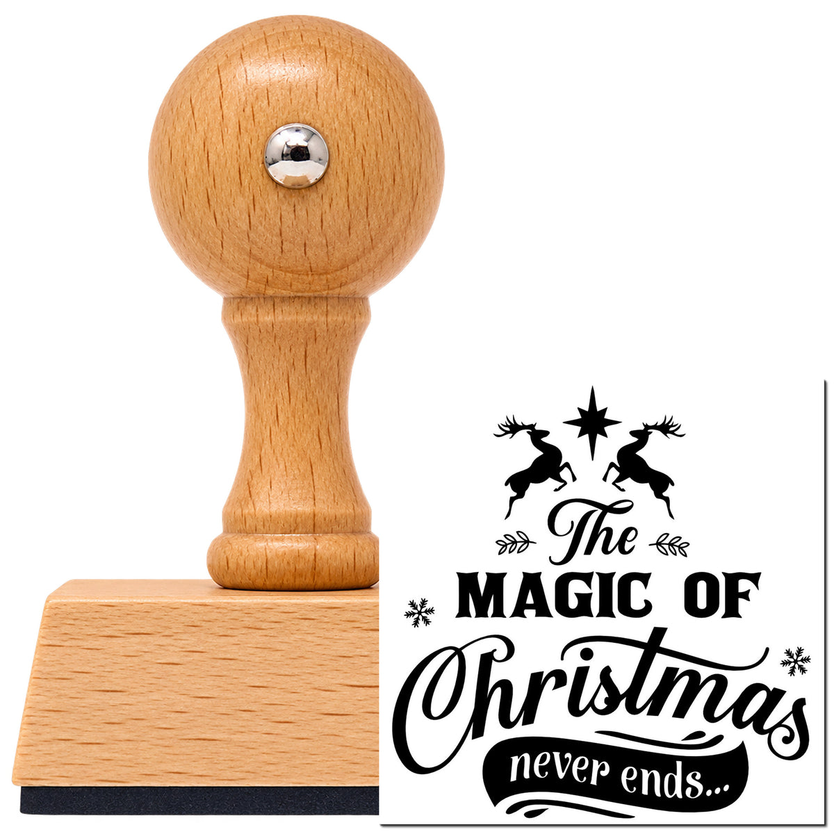 Vintage Pro beech wood stamp with a round knob handle, shown with its black The Magic Of Christmas Never Ends imprint on white.
