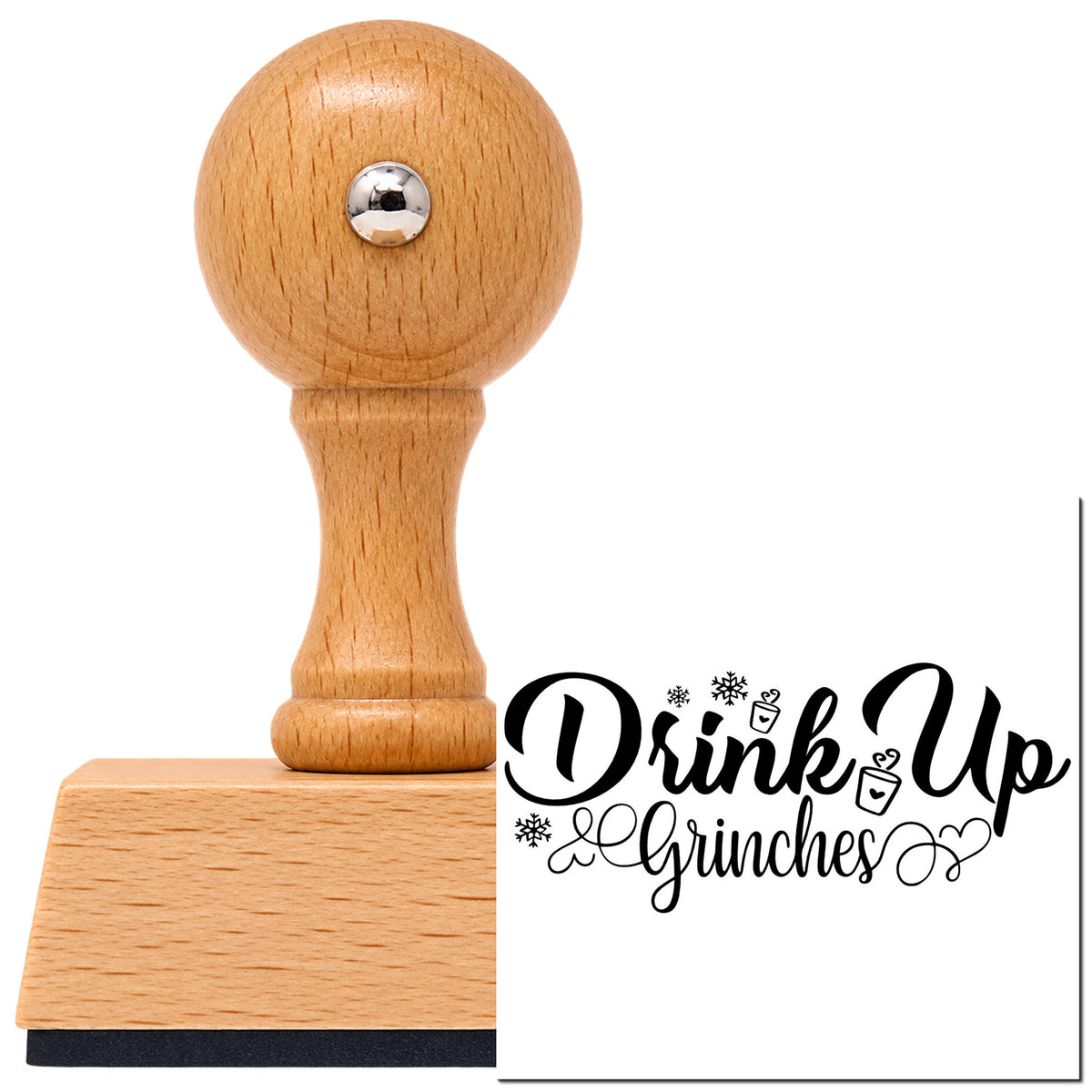 Vintage Pro beech wood stamp with a round knob handle, shown with its black Drink Up Grinches imprint on white.