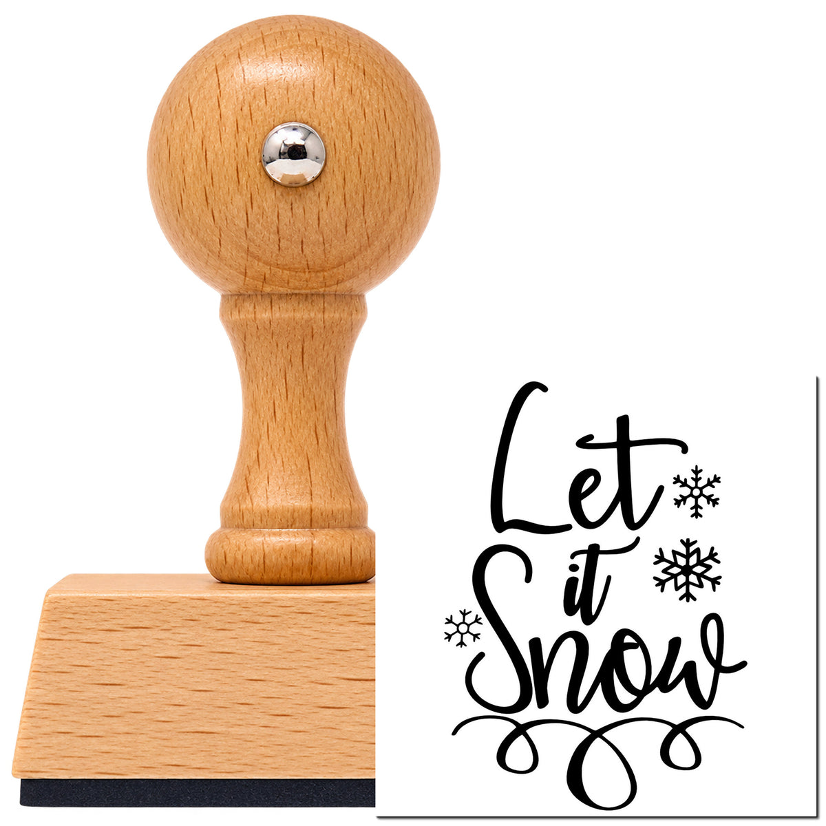 Vintage Pro beech wood stamp with a round knob handle, shown with its black Let It Snow Loop Flourish imprint on white.