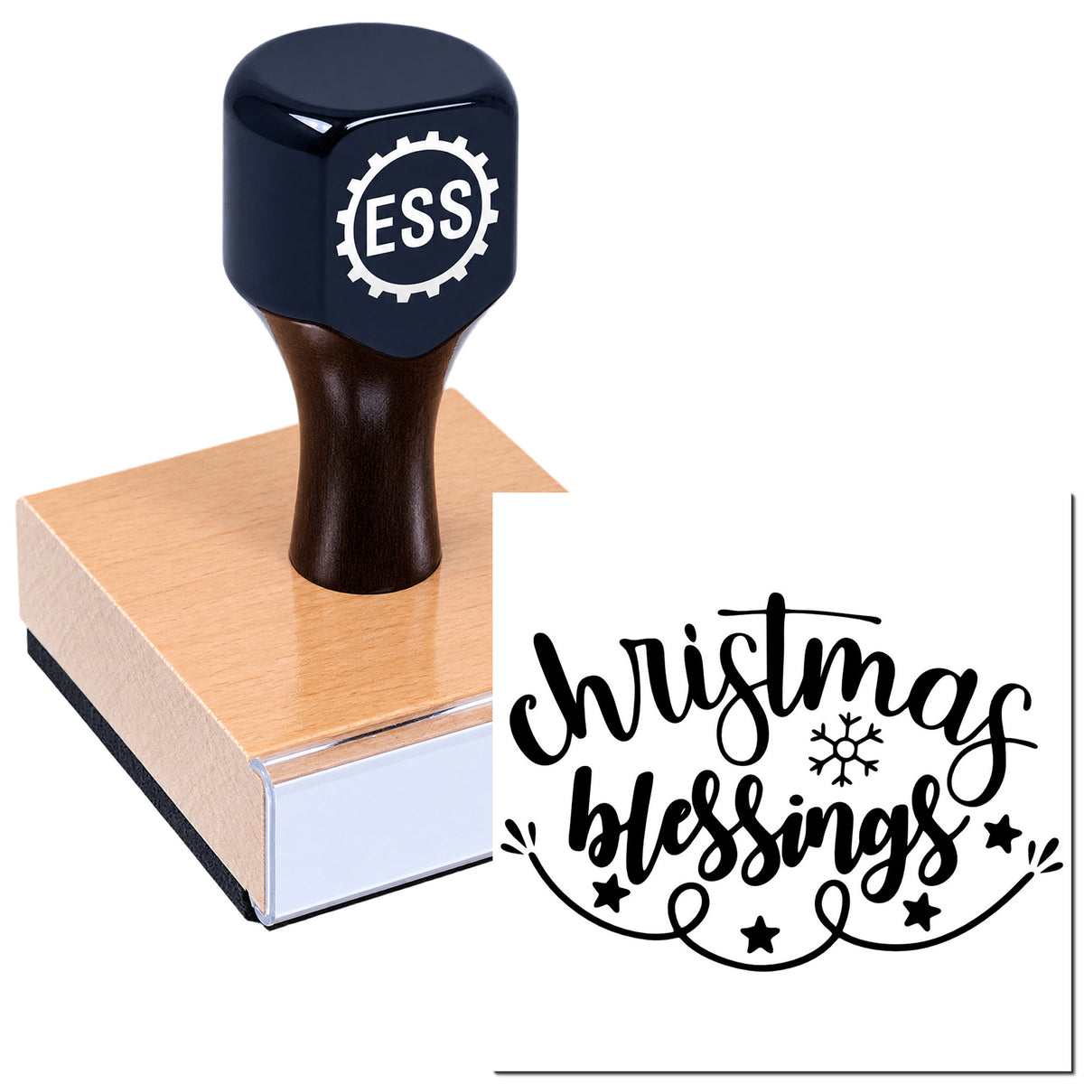 Dark navy custom rubber stamp and seal on wooden block, with black "Christmas blessings" script, snowflake and stars.