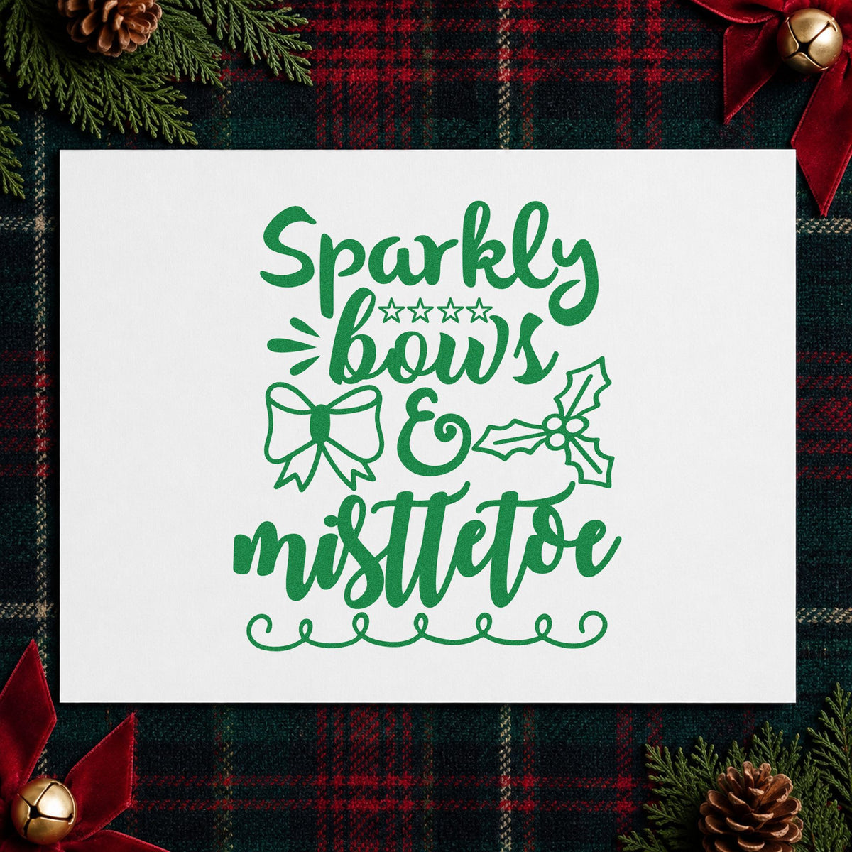 Sparkly Bows And Mistletoe craft stamp imprint in green ink on a handmade project, one idea being sparkle ribbon tags.
