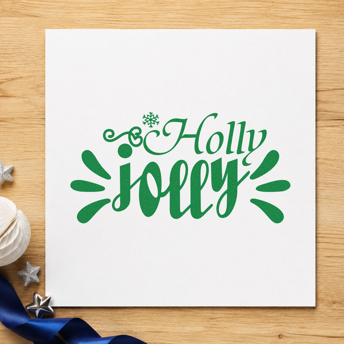 Holly Jolly Accent Rays craft stamp imprint in green ink on a handmade project, one idea being spotlight table signs.