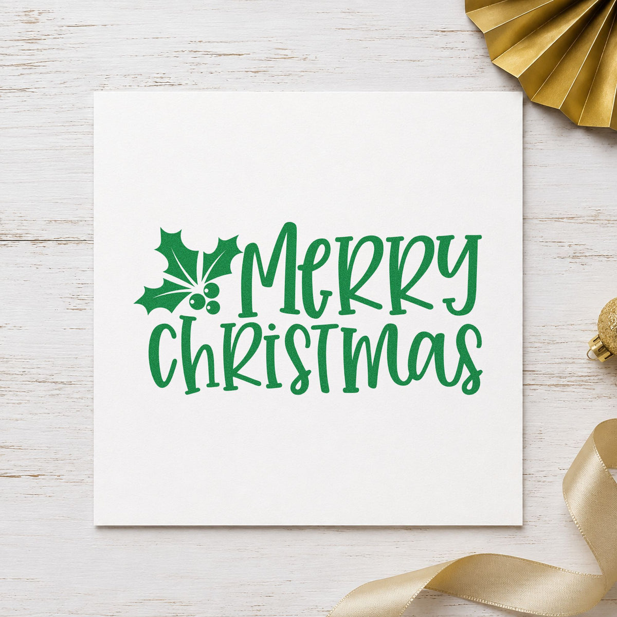 Merry Christmas Holly Corner craft stamp imprint in green ink on a handmade project, one idea being asymmetric gift tags.