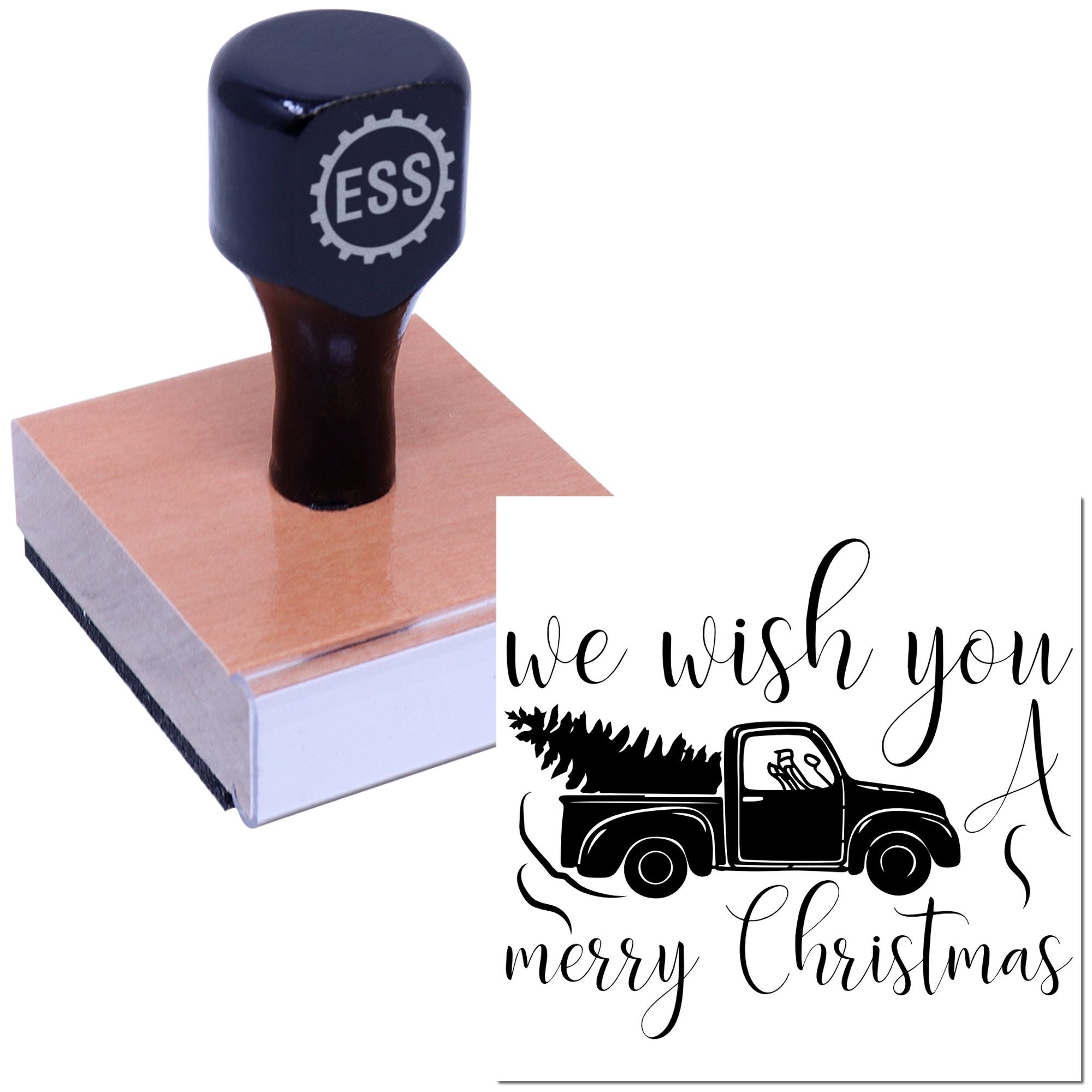 Navy-black ESS seal stamp on a wood block, with festive We wish you a merry Christmas truck design.