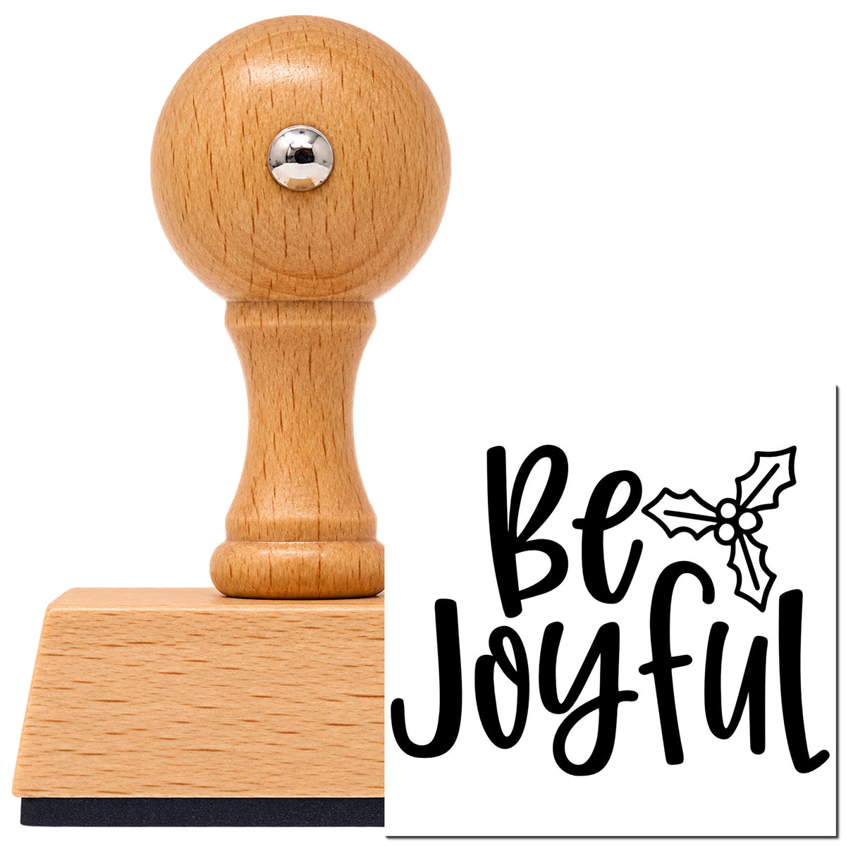 Vintage Pro beech wood stamp with a round knob handle, shown with its black Be Joyful Holly imprint on white.