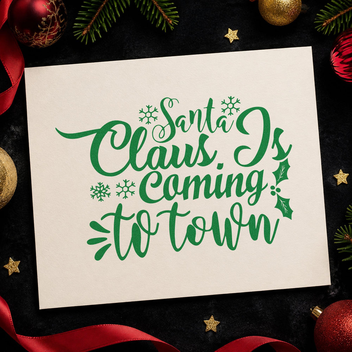 Santa Claus Coming To Town craft stamp imprint in green ink on a handmade project, one idea being route map gift tags.