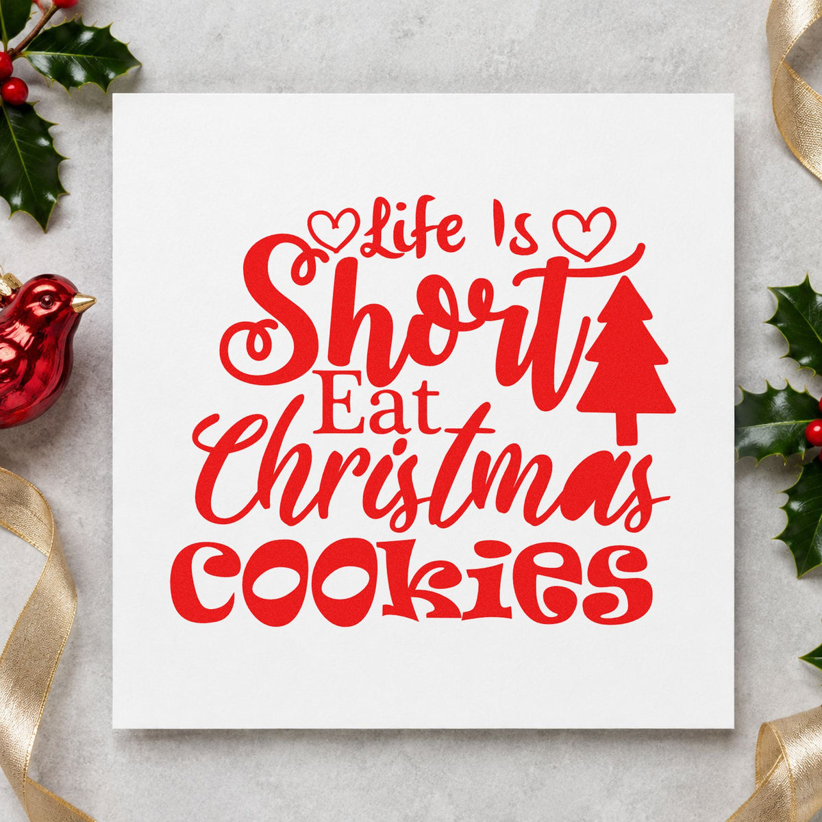 Life Short Eat Christmas Cookies craft stamp in red ink on cardstock, an easy option for apron hem printing.
