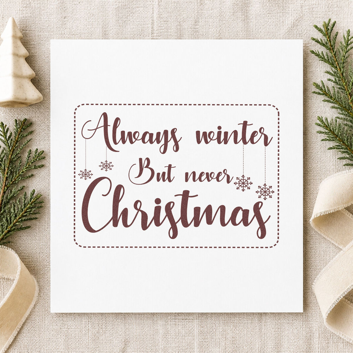 Always Winter Never Christmas rubber stamp printed in brown ink, ready for reading log sheet and similar paper crafts.