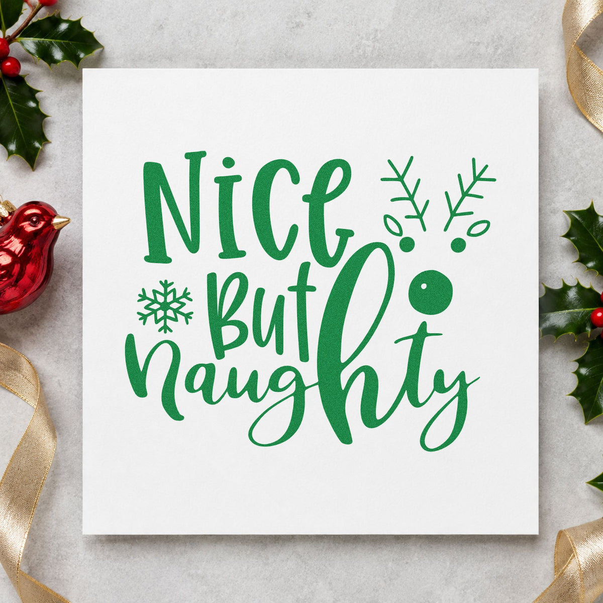Nice But Naughty Reindeer craft stamp imprint in green ink on a handmade project, one idea being either way gift tags.
