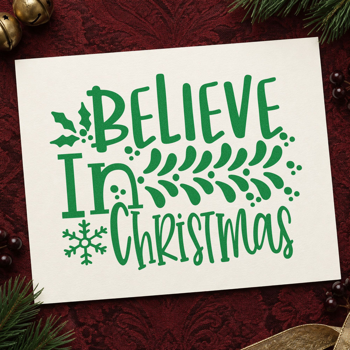 Believe In Christmas Branch craft stamp imprint in green ink on a handmade project, one idea being study book gift tags.