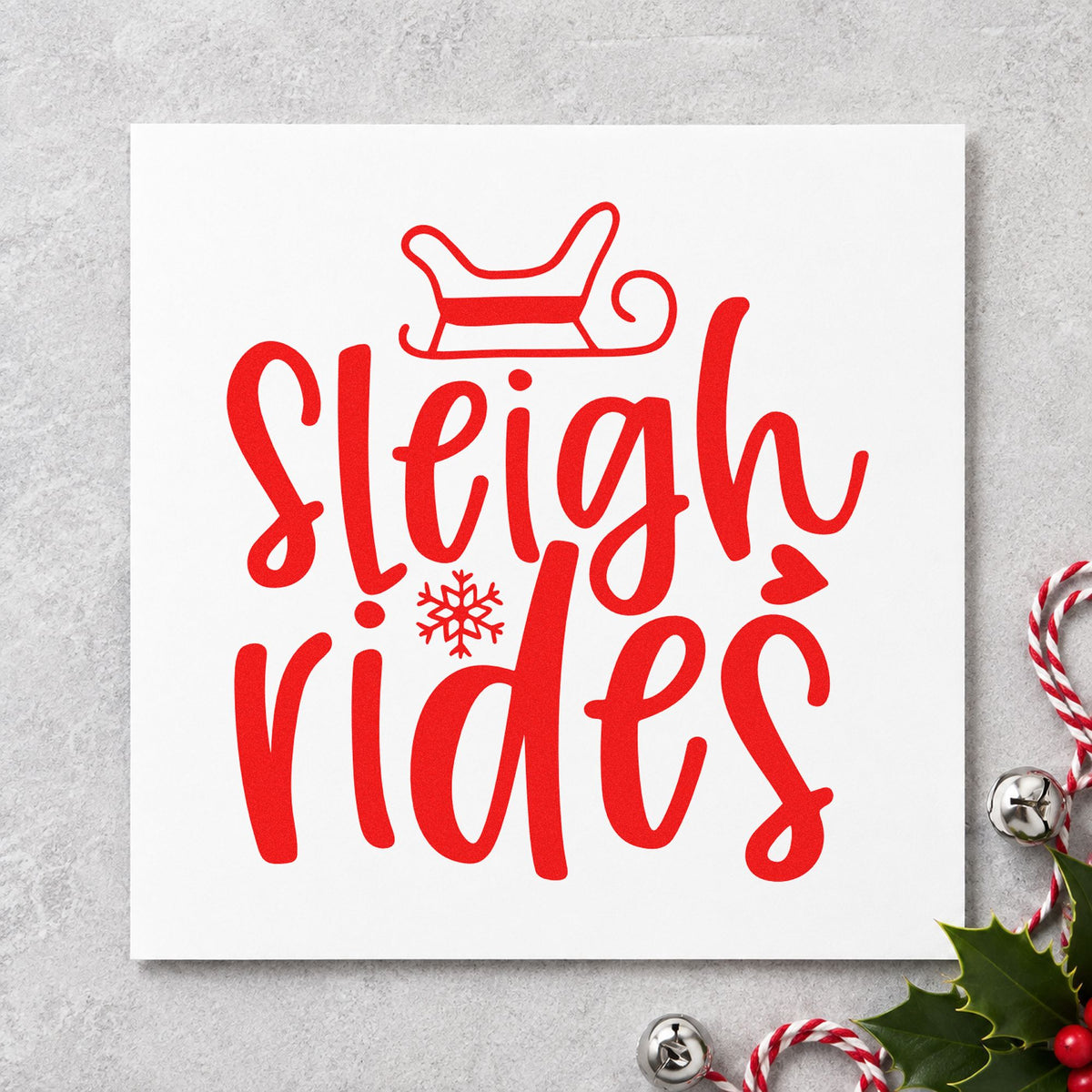 Sleigh Rides Winter Lettering craft stamp in red ink on cardstock, an easy option for seat cushion printing.