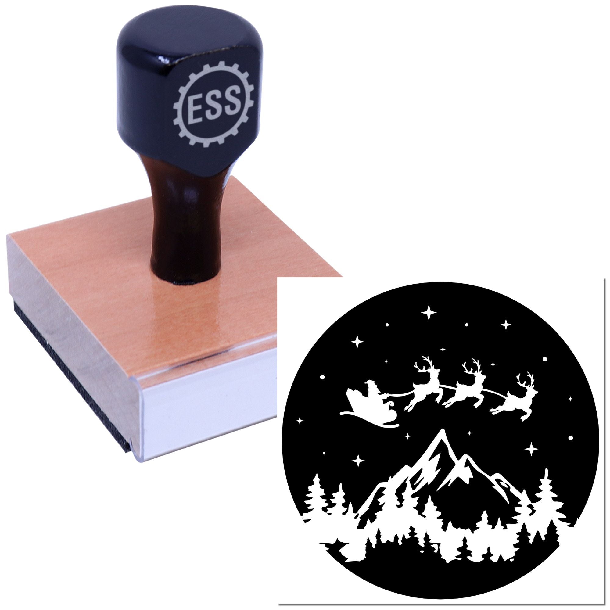 Black ESS rubber stamp on a wooden block, with a custom circular seal design featuring Santa sleigh, reindeer, mountains and trees.