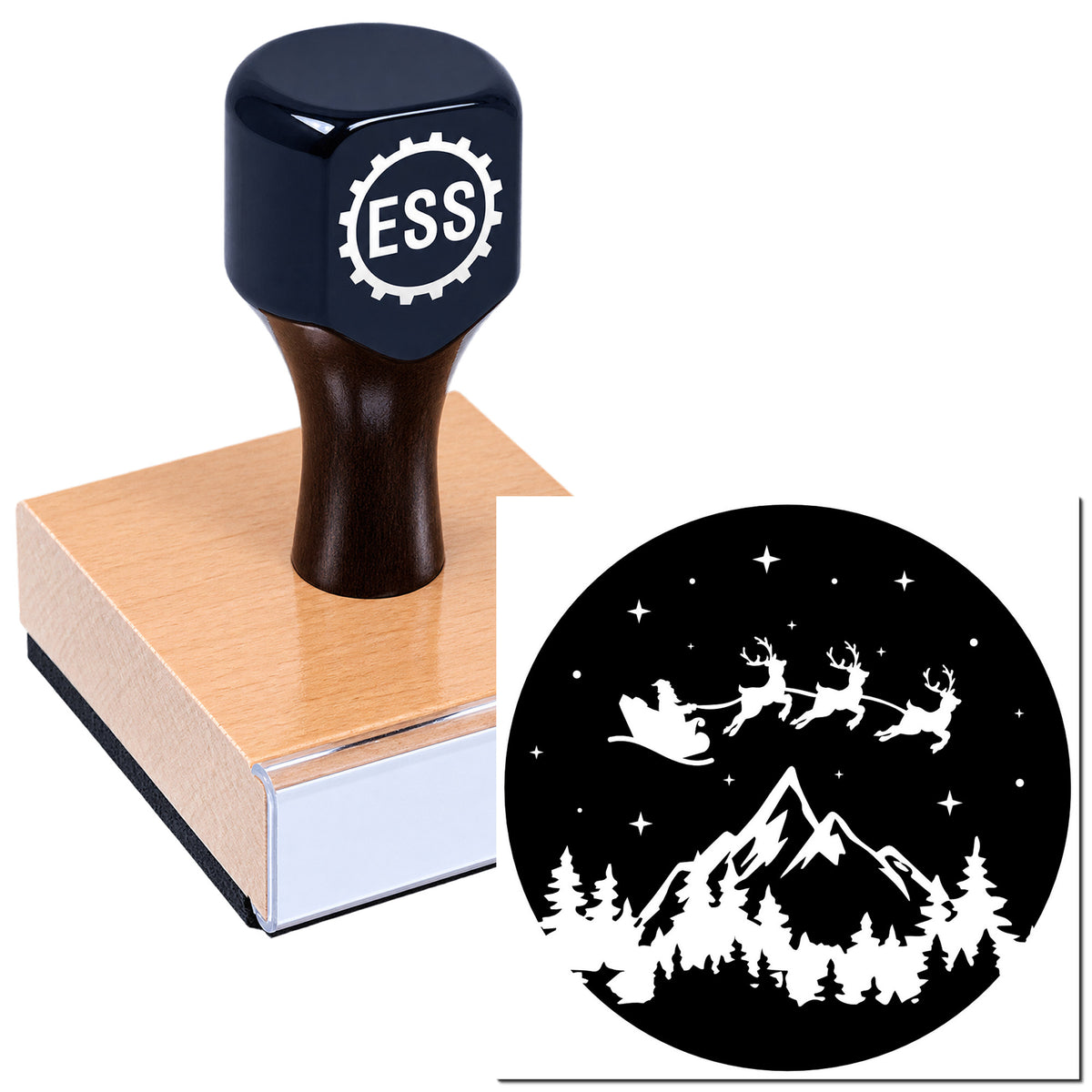 Black ESS rubber stamp on a wooden block, with a custom circular seal design featuring Santa sleigh, reindeer, mountains and trees.