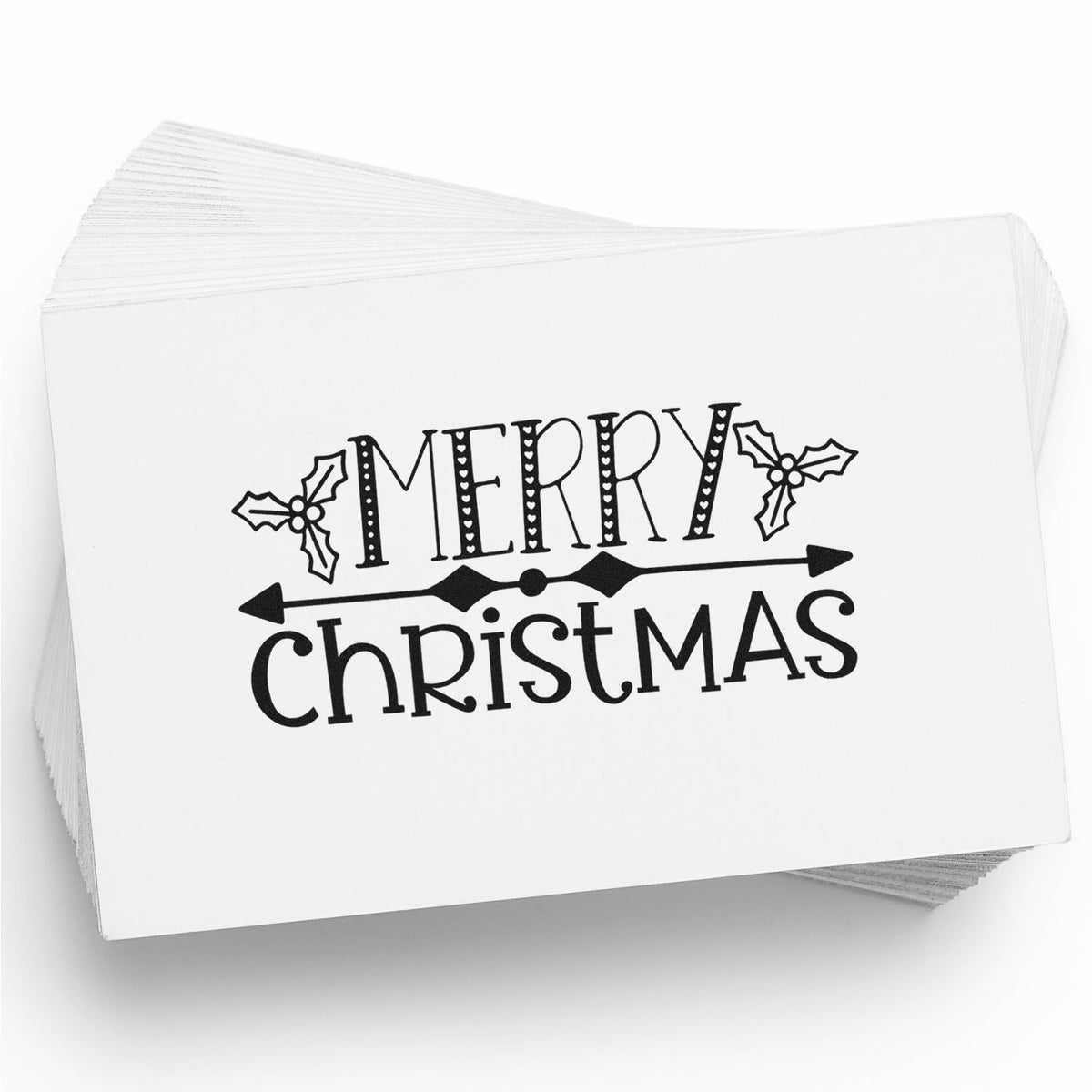 Stack of white stamp cards featuring a black Merry Christmas seal with holly accents