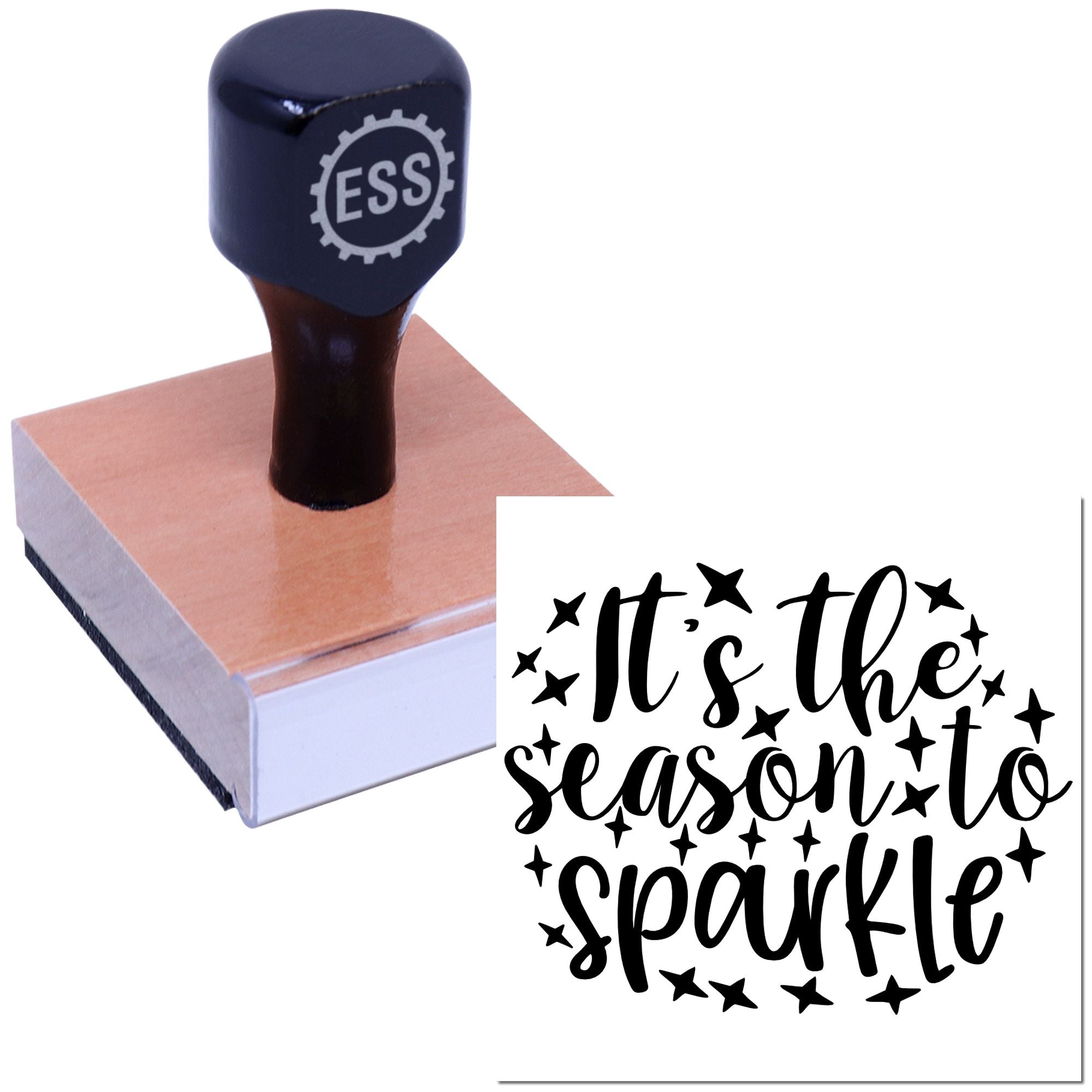 Navy rubber stamp with wooden base, making a black Its the season to sparkle seal with stars.
