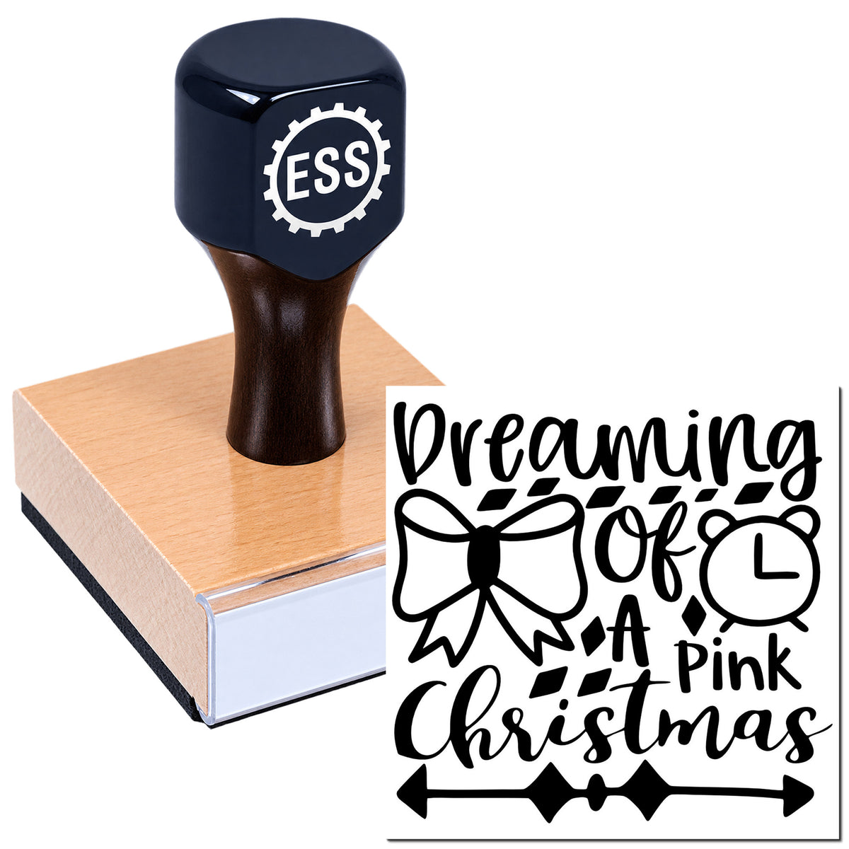 Dark navy ESS stamp on wood block beside black Christmas seal design with bow, clock, and "Dreaming of a Pink Christmas" text.