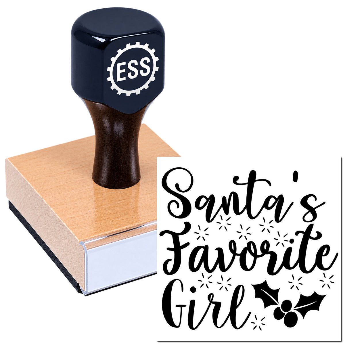 Black ESS stamp on a pink wooden block, with a "Santa's Favorite Girl" holiday seal in black script and holly accents.
