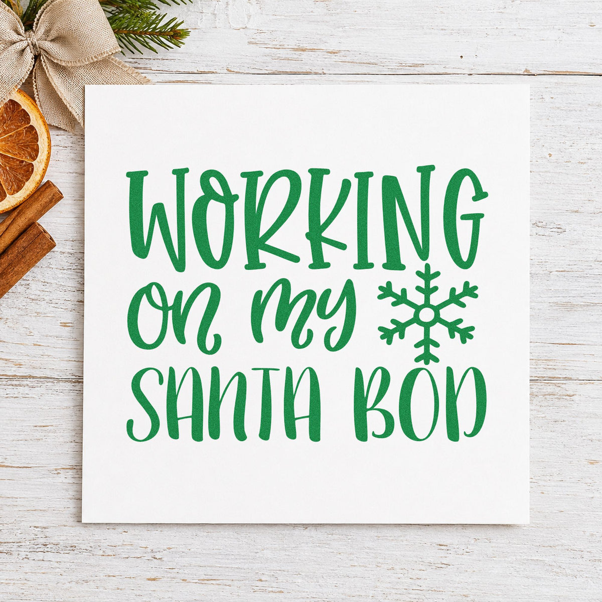 Working On My Santa Bod craft stamp imprint in green ink on a handmade project, one idea being snack box gift tags.