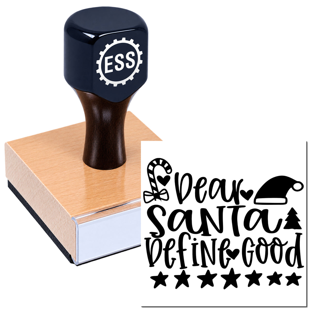 Dark navy ESS rubber stamp on a pink wood block beside a black "Dear Santa Define Good" holiday seal design.