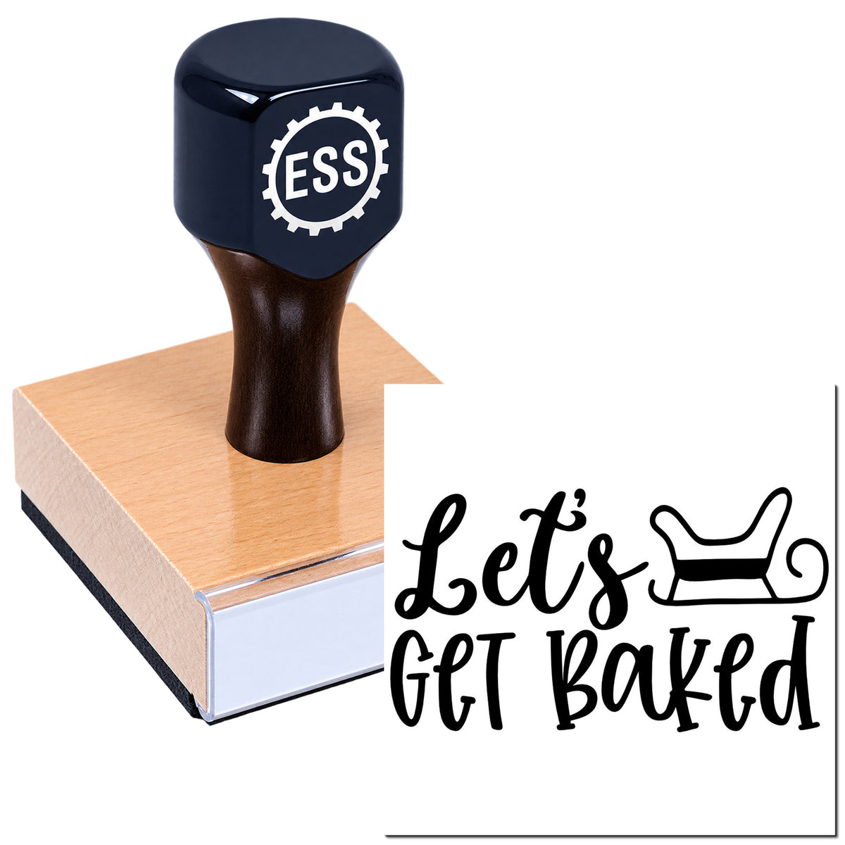 Dark navy rubber stamp with ESS gear logo on a wooden block beside a white seal reading "Let's Get Baked" with sleigh graphic.