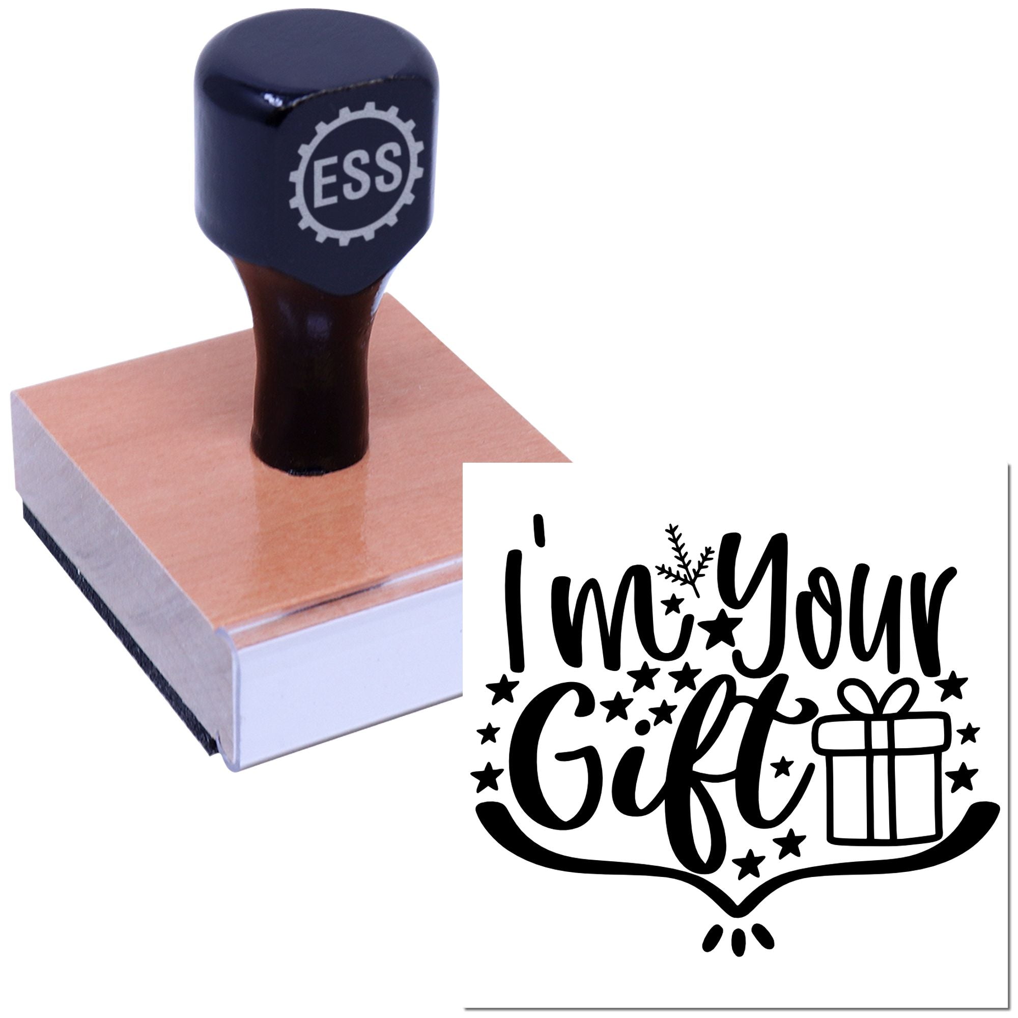 Dark navy custom stamp and seal set on a block, showing black Im Your Gift script with stars and a gift icon.