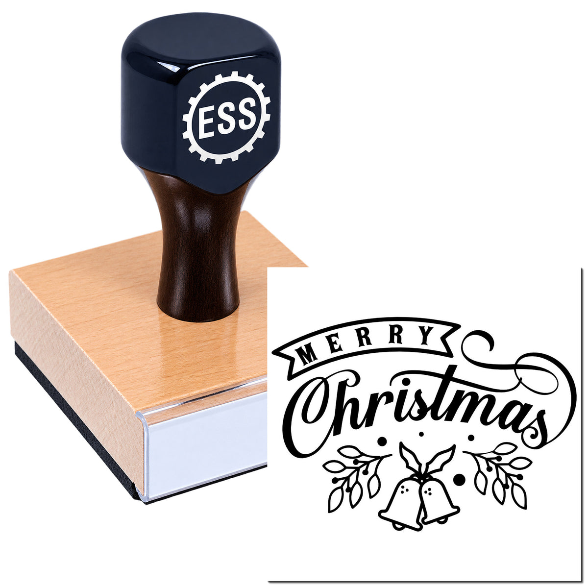 Dark blue ESS rubber stamp on pink wooden base with black Merry Christmas seal design, bells and holly.