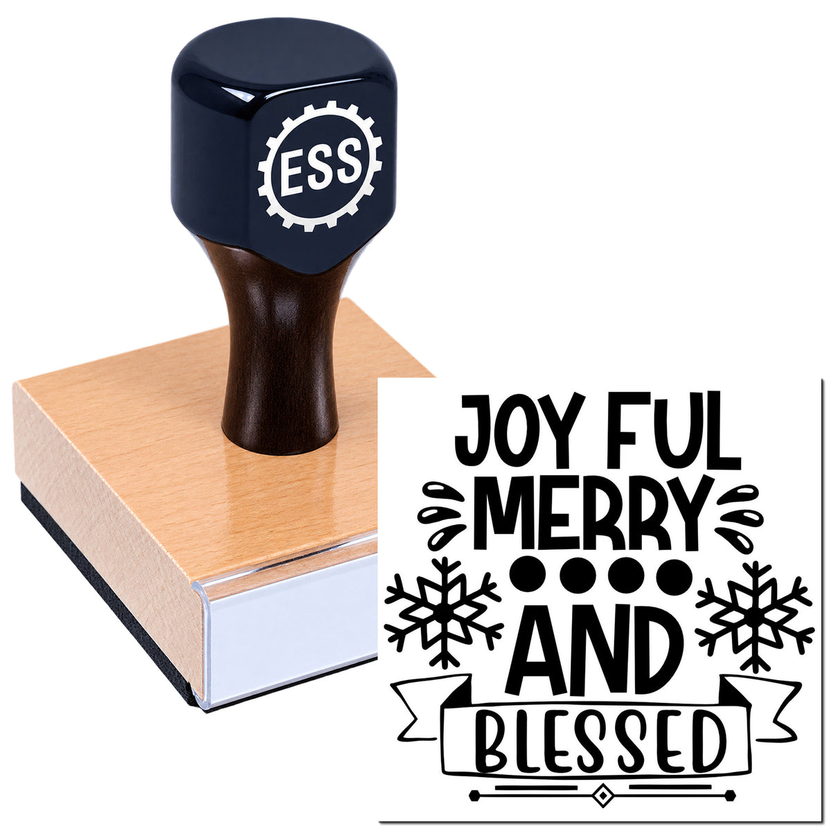 Black ESS rubber stamp on wooden block beside black festive seal reading Joyful Merry and Blessed with snowflakes.