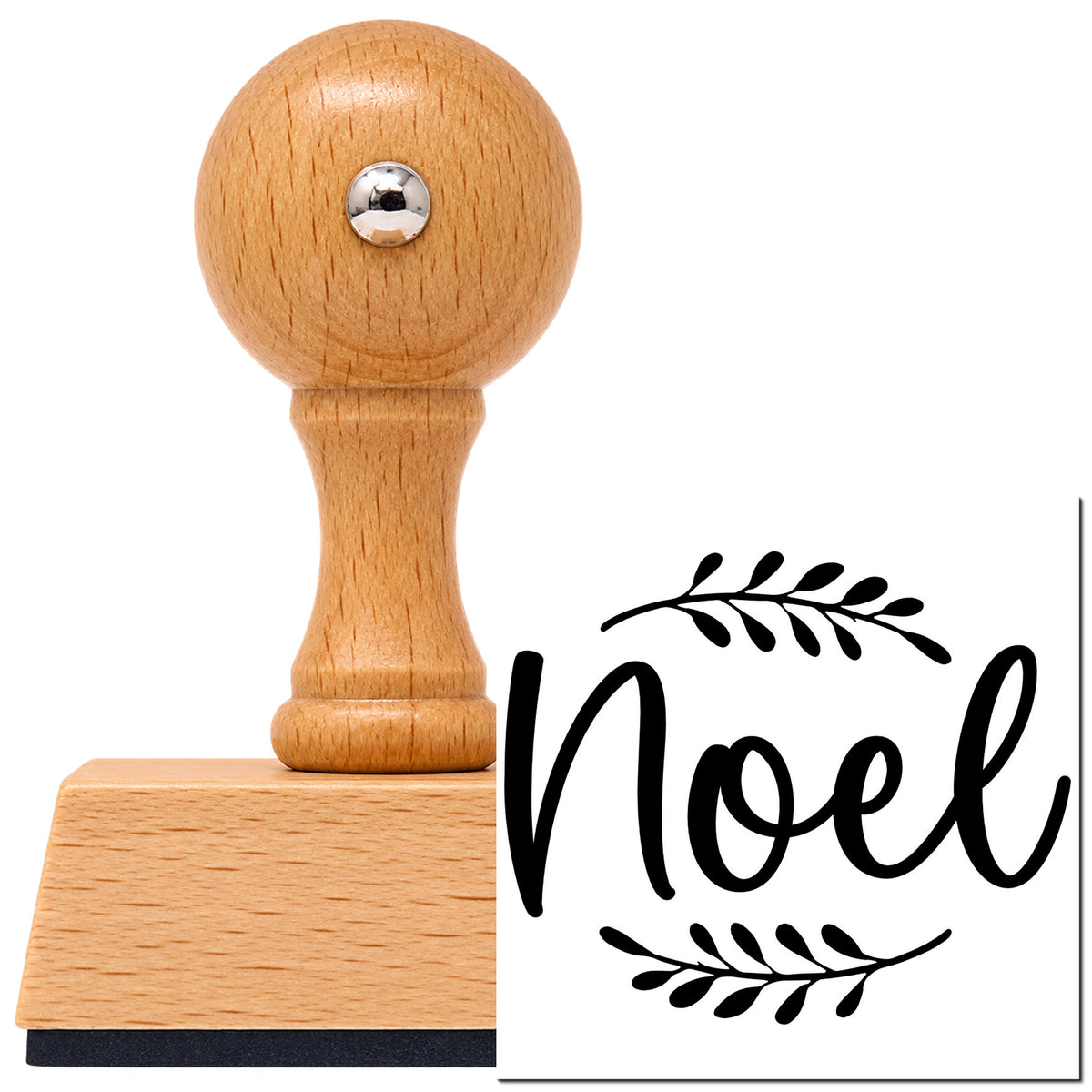 Vintage Pro beech wood stamp with a round knob handle, shown with its black Noel With Leafy Sprigs Script Lettering imprint on white.