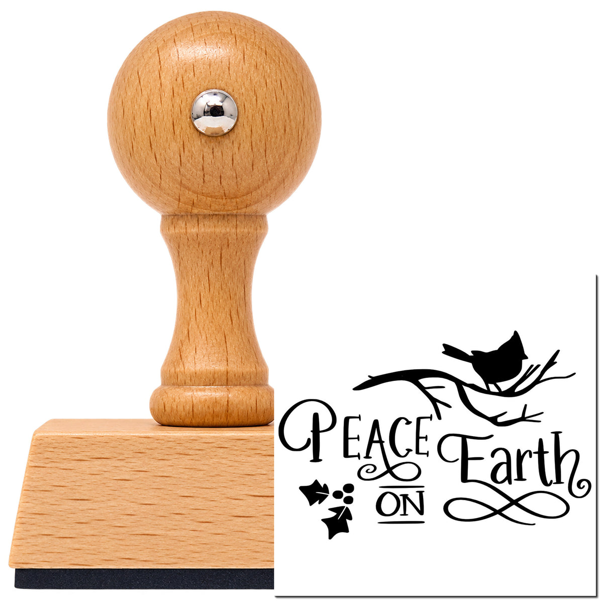 Vintage Pro beech wood stamp with a round knob handle, shown with its black Peace On Earth Bird Branch imprint on white.