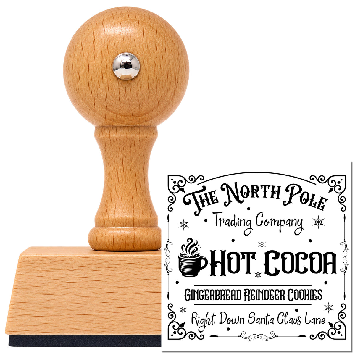 Vintage Pro beech wood stamp with a round knob handle, shown with its black North Pole Trading Hot Cocoa imprint on white.